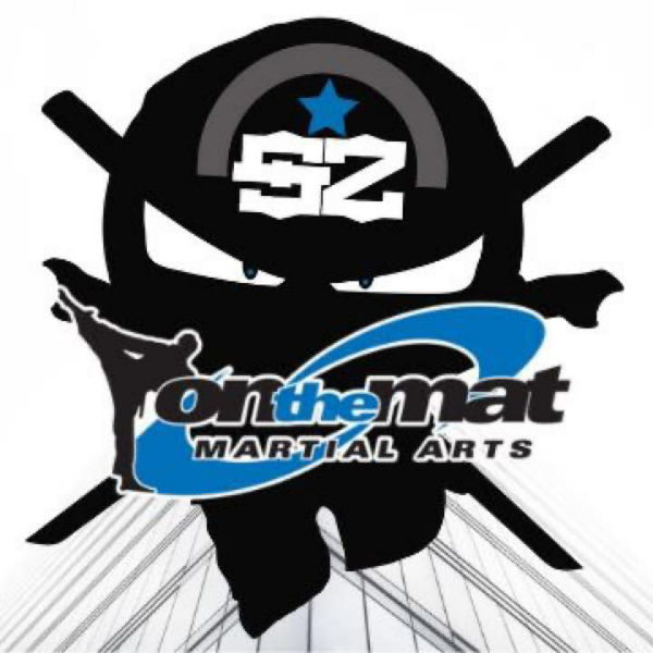 On The Mat Martial Arts logo