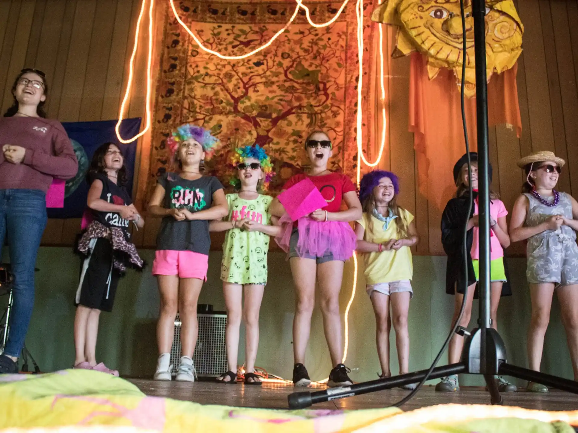 a group of girls on a stage