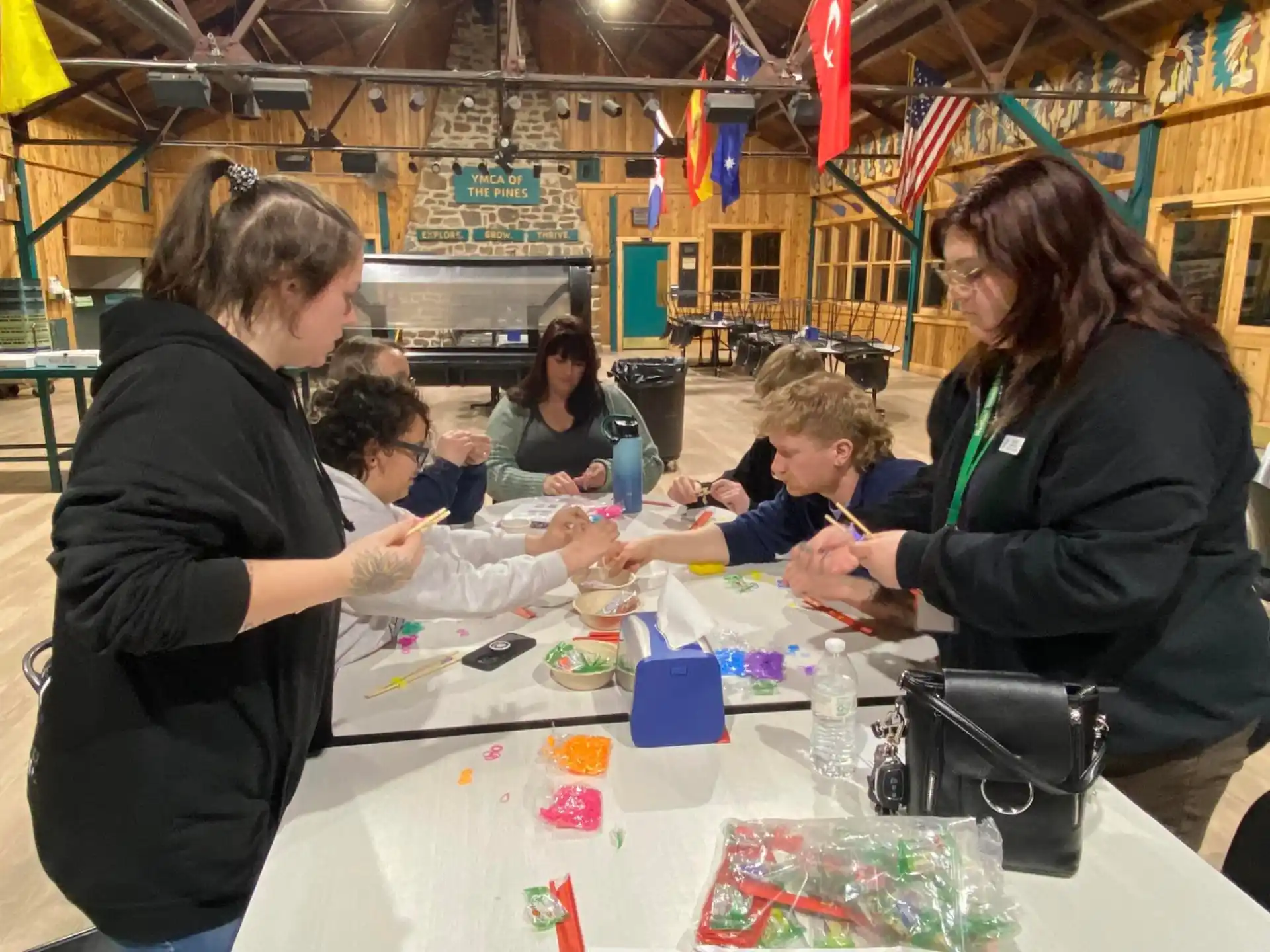 a group of people working at a table