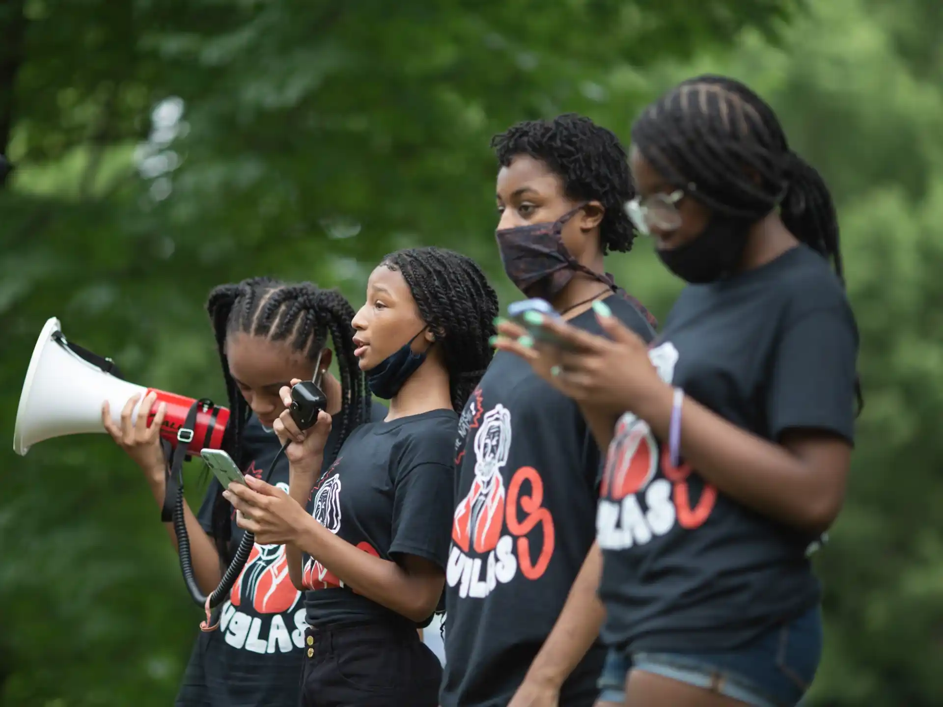 a group of people holding microphones
