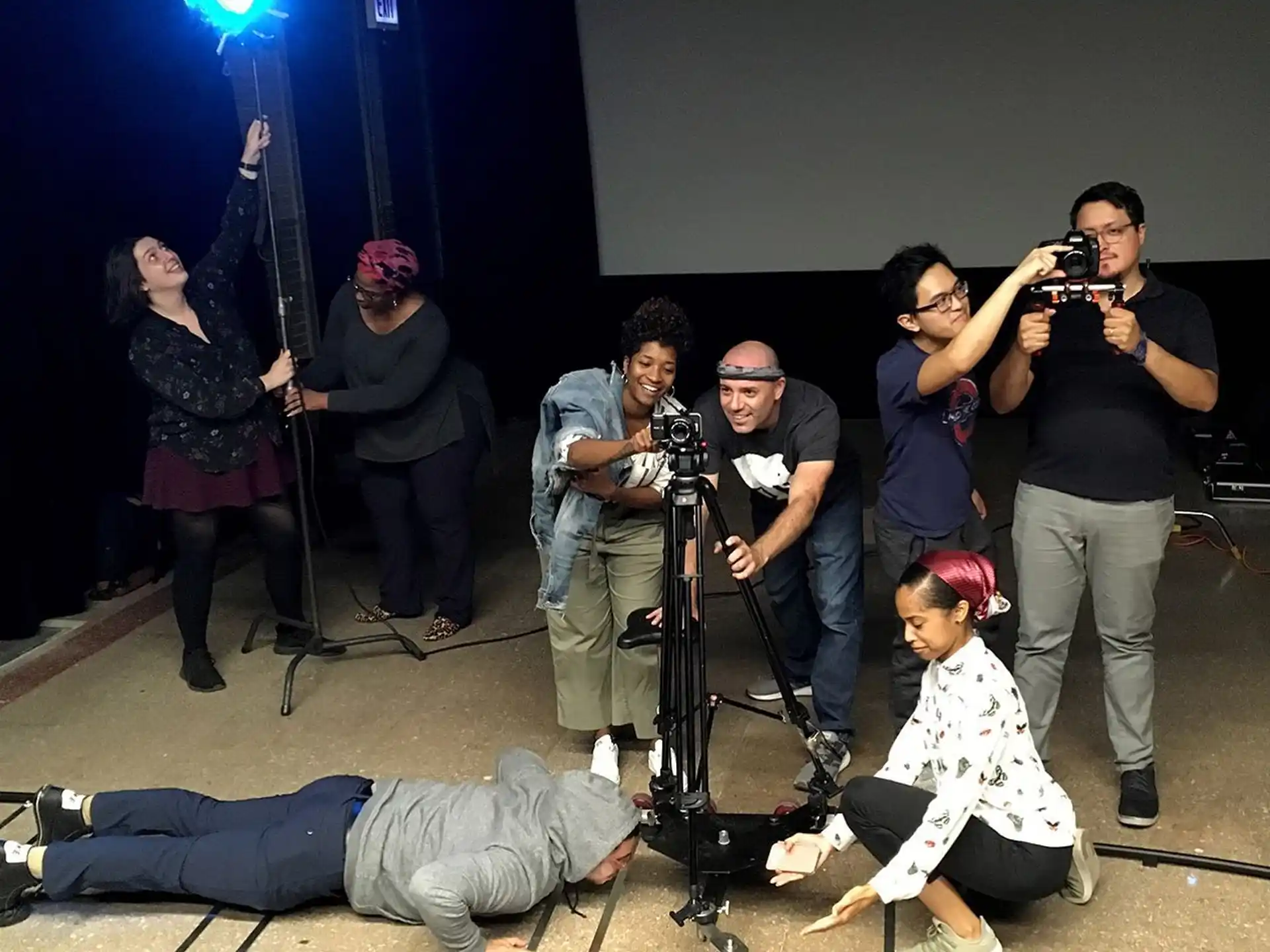 a group of people taking pictures