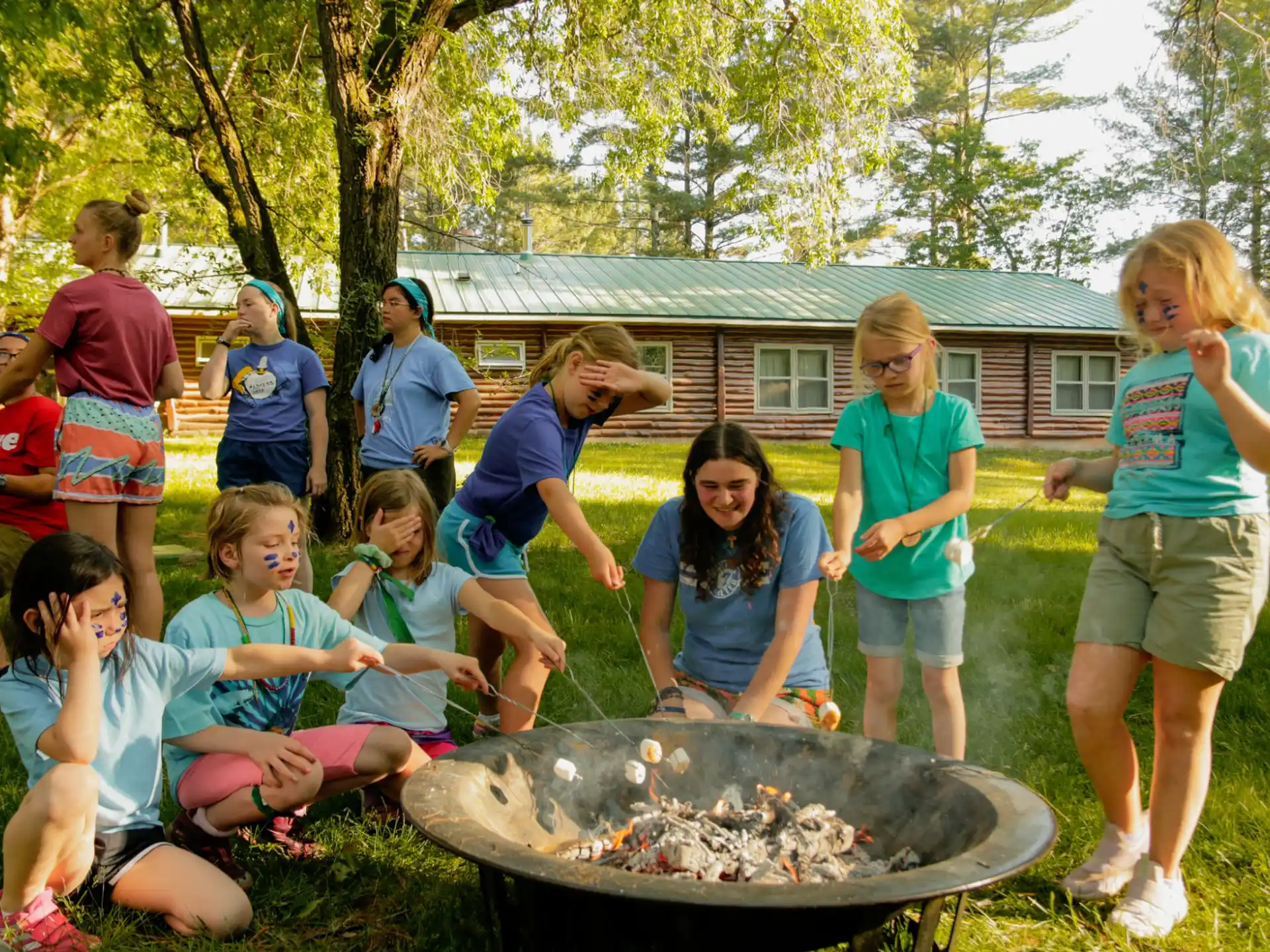 a group of people around a fire