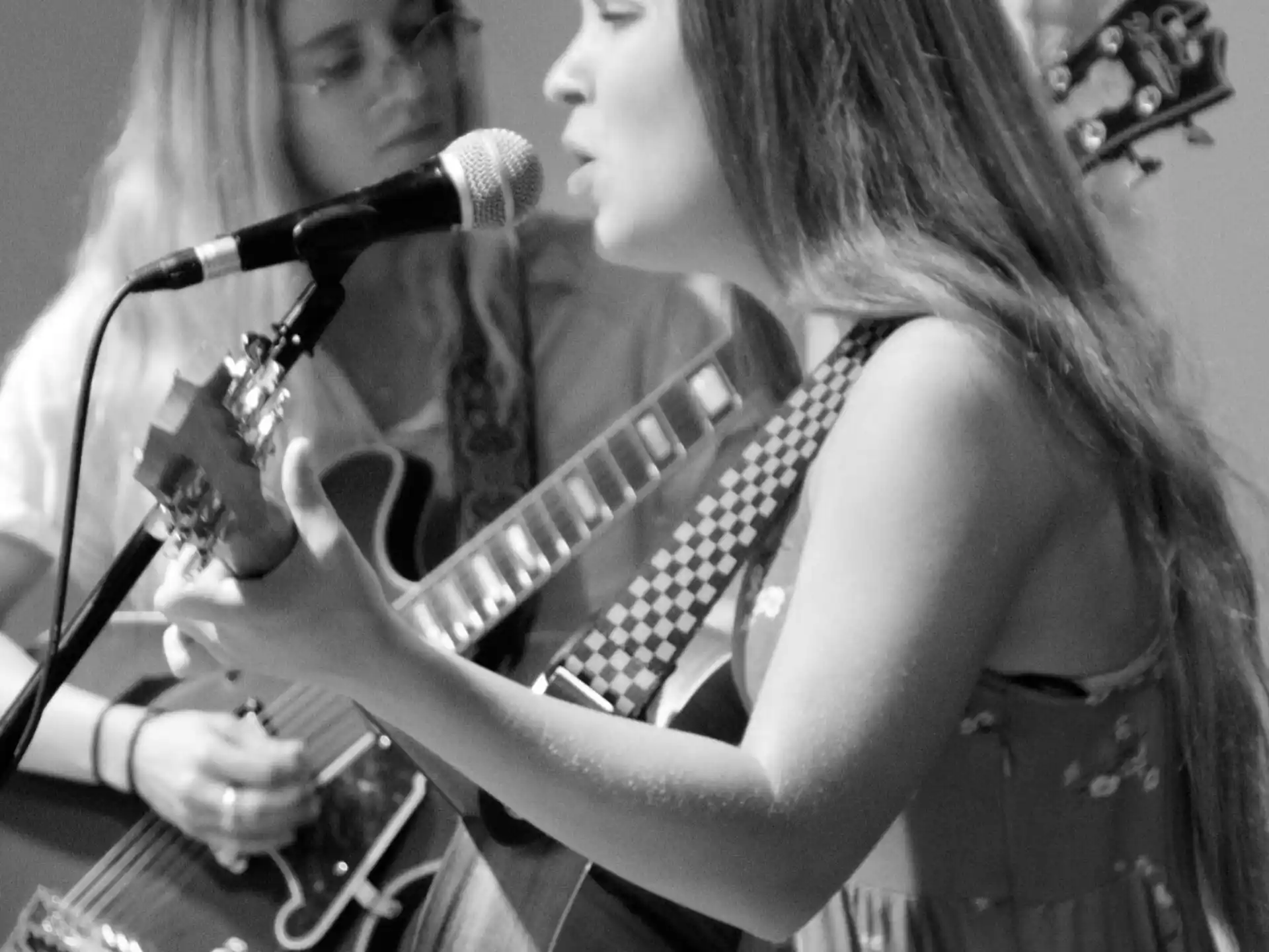 a couple of women playing instruments