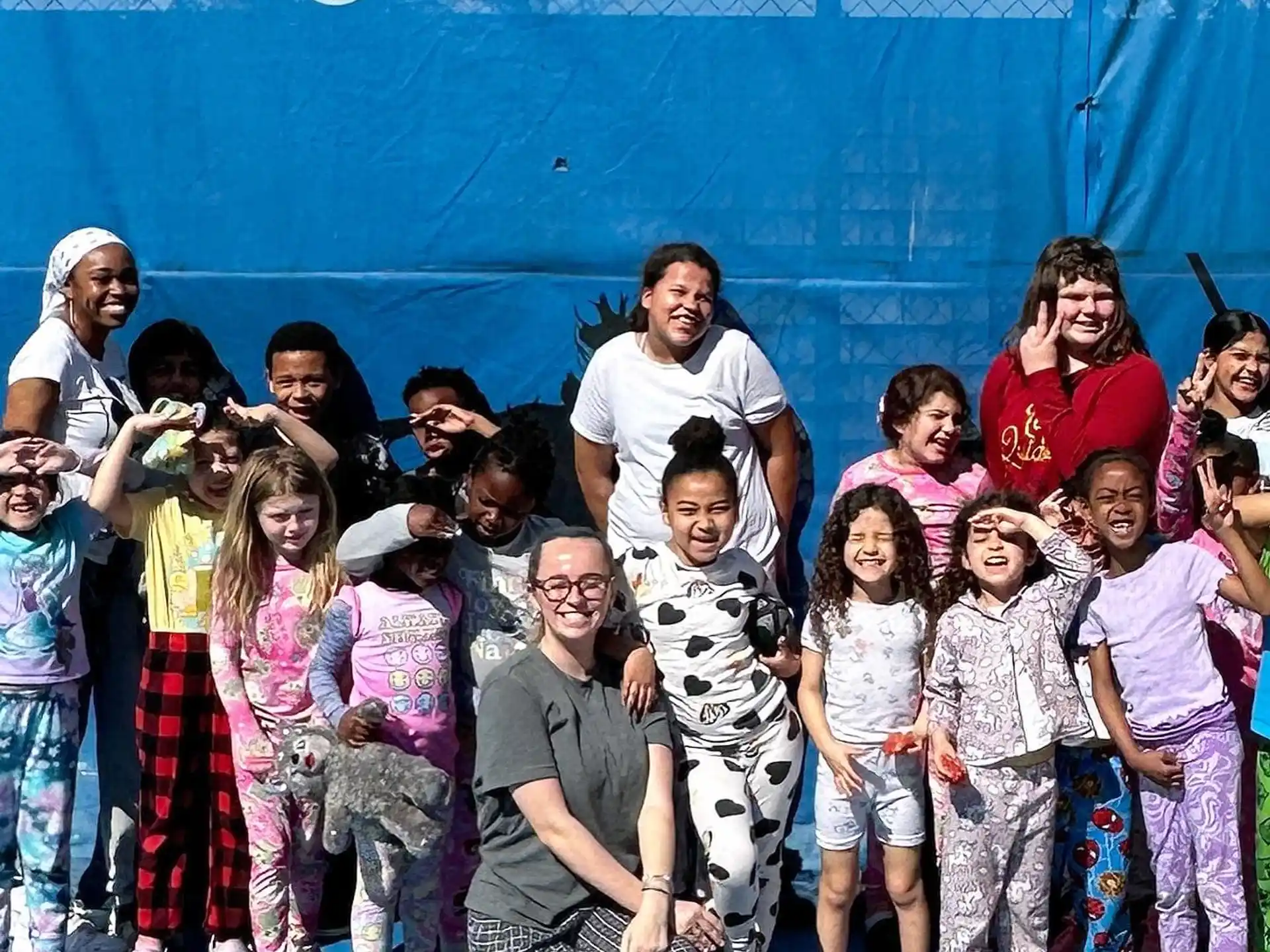 a group of people posing for a photo