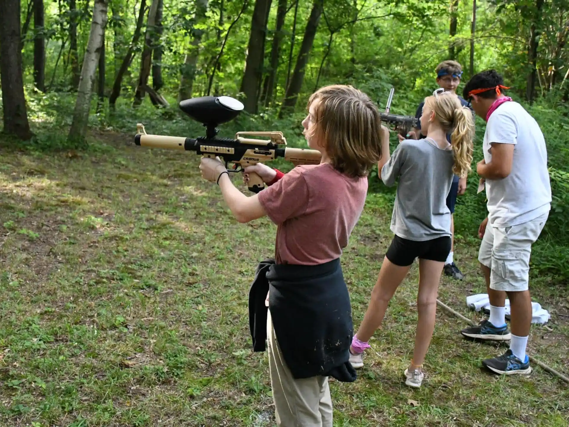 a group of people in the woods