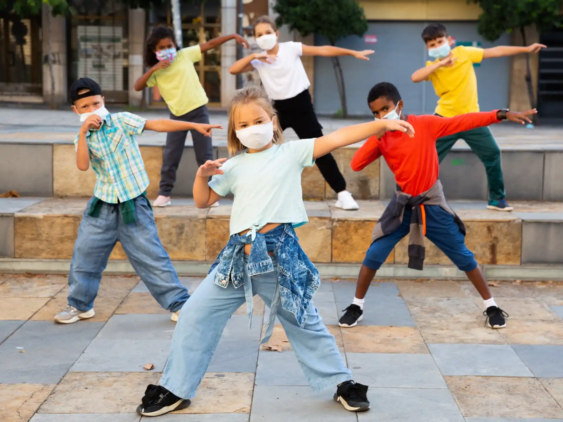 a group of people jumping in the air