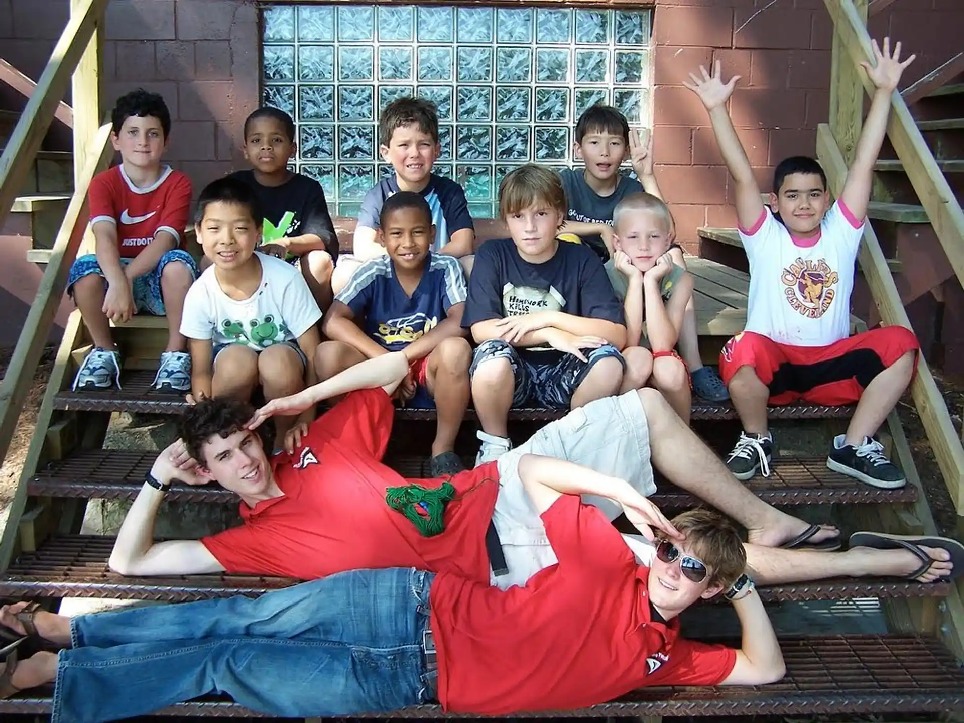 a group of people sitting on a bench