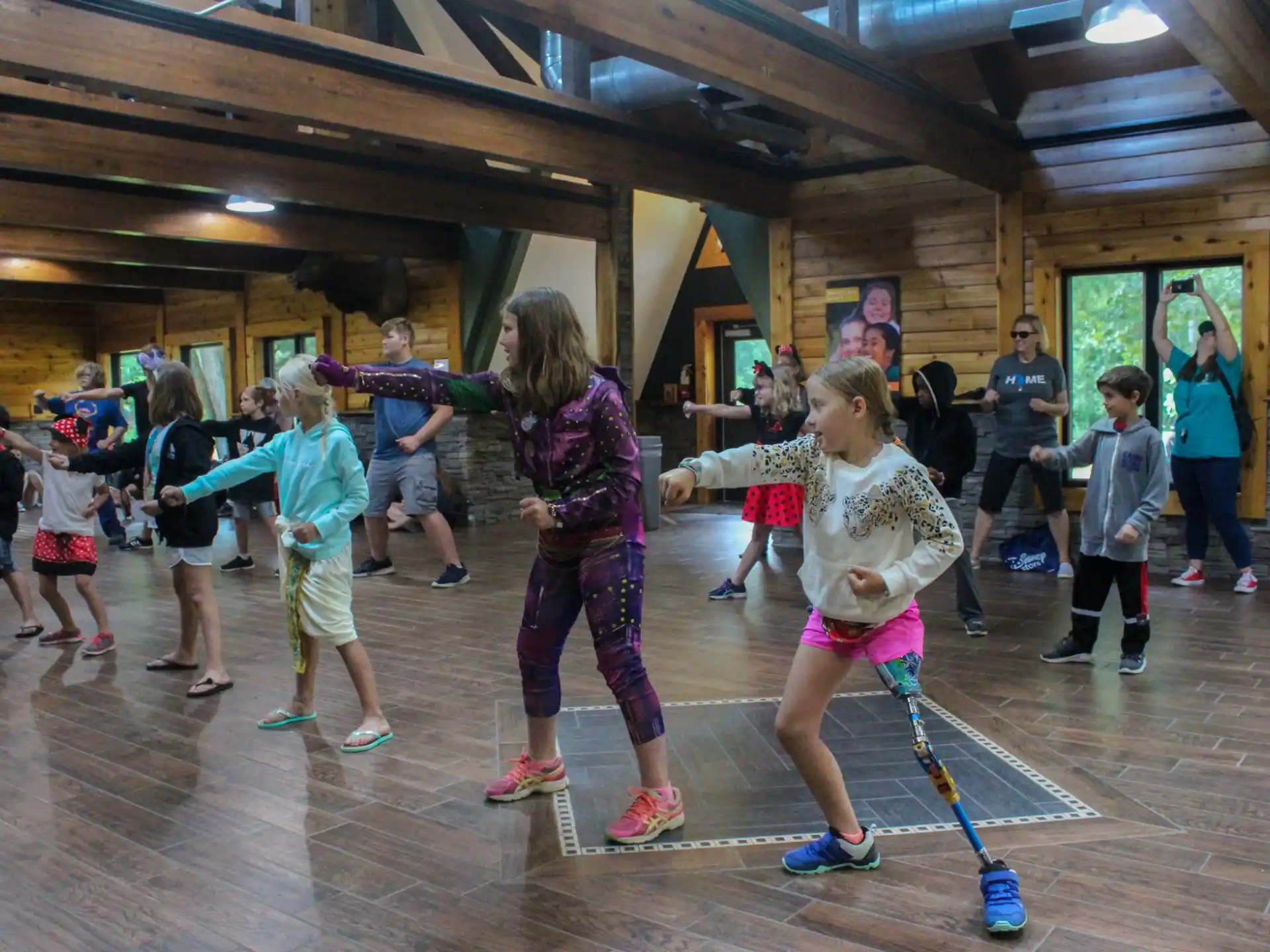 a group of children playing hockey