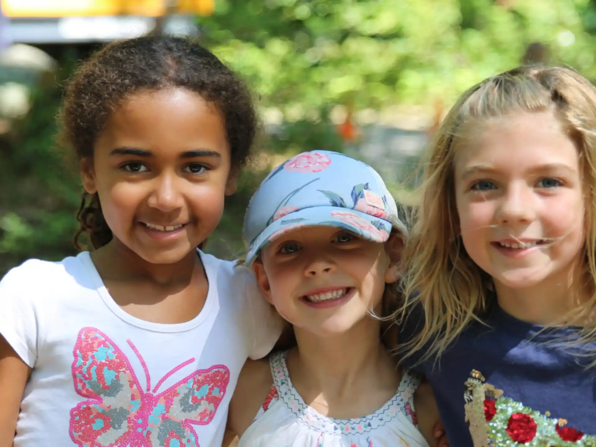 a group of girls smiling