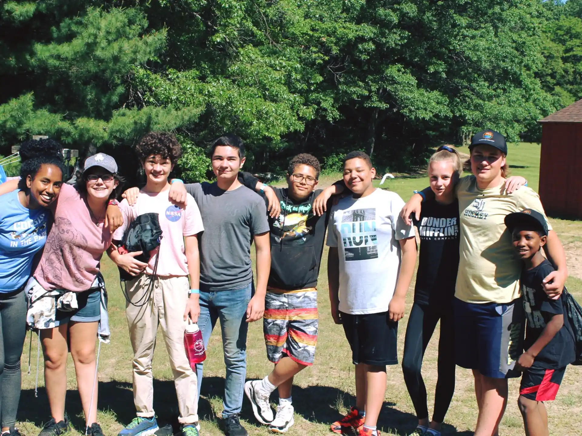 a group of people posing for a photo
