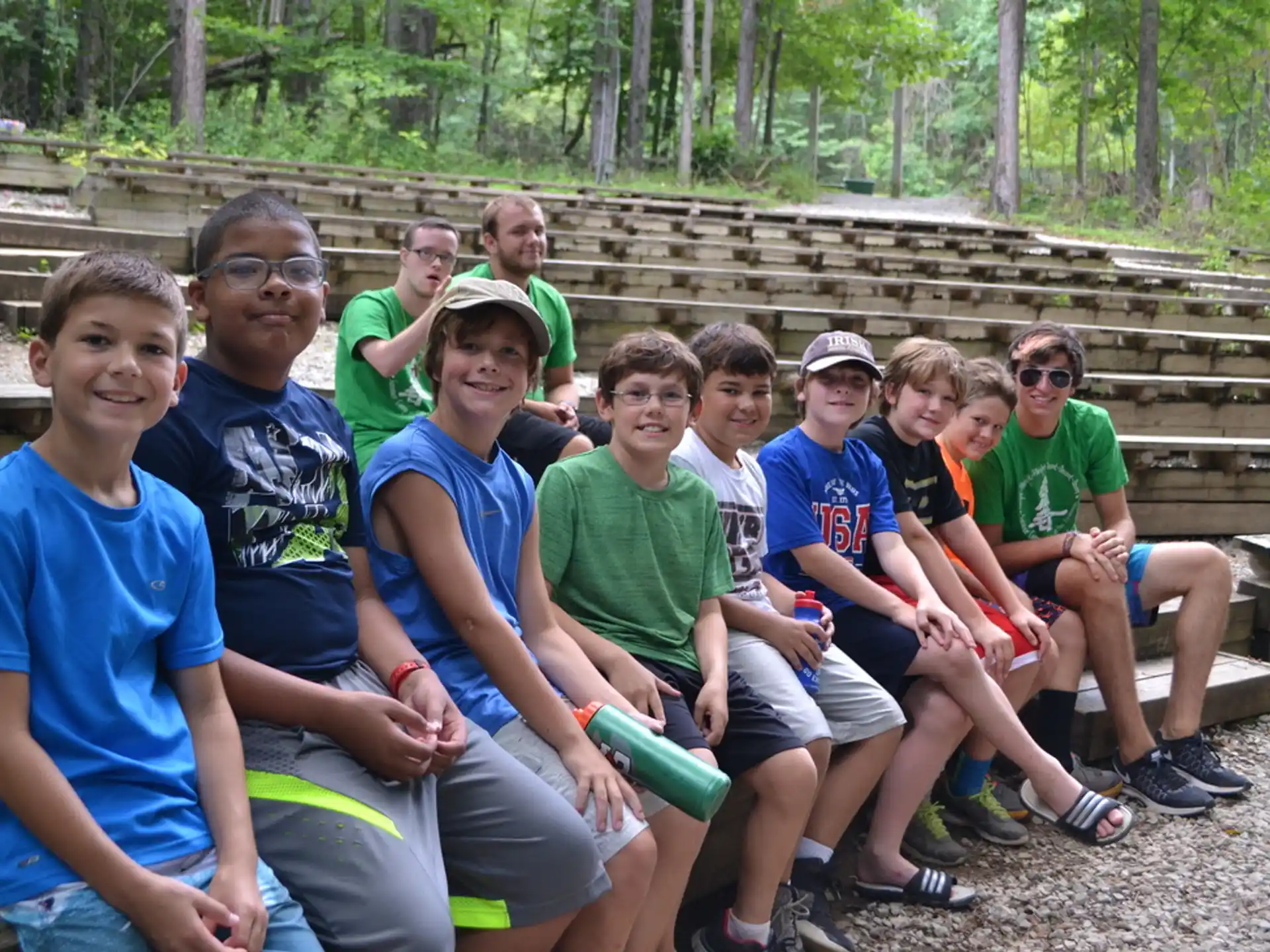 a group of people sitting on a bench