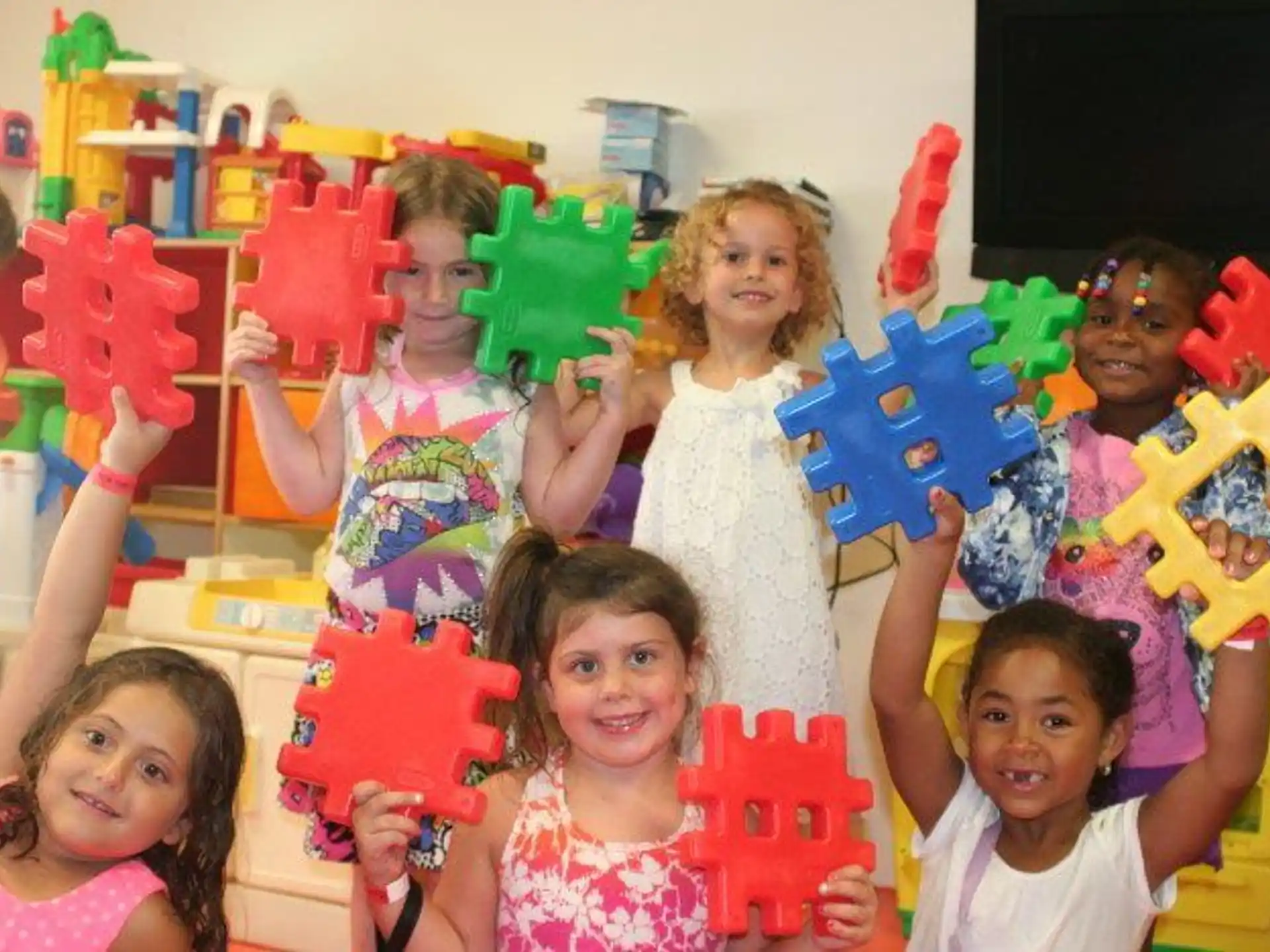 a group of children posing for a photo