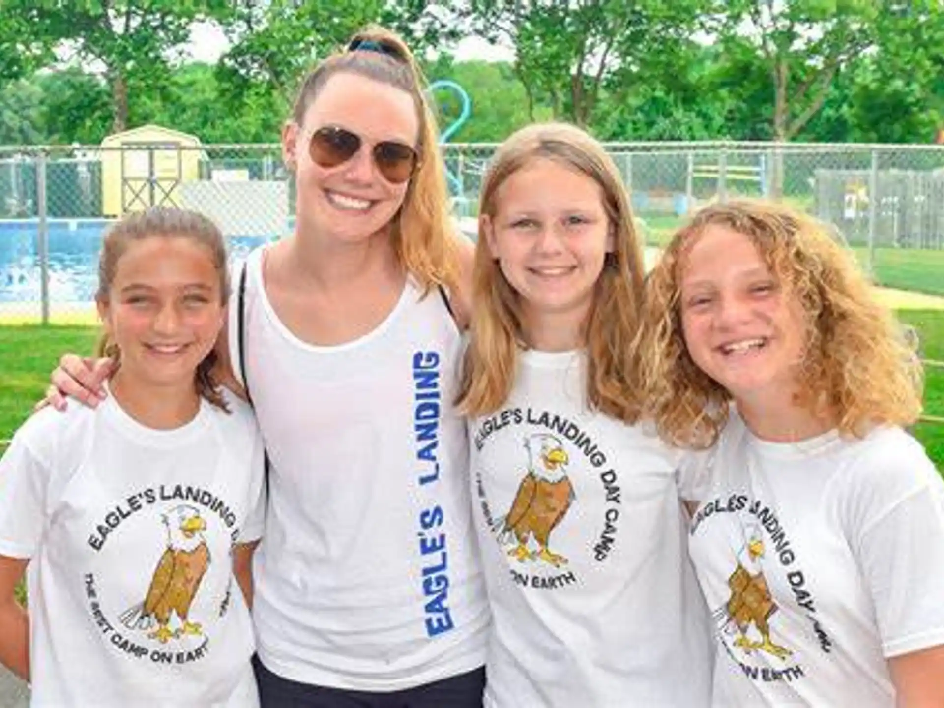 a group of girls posing for a photo
