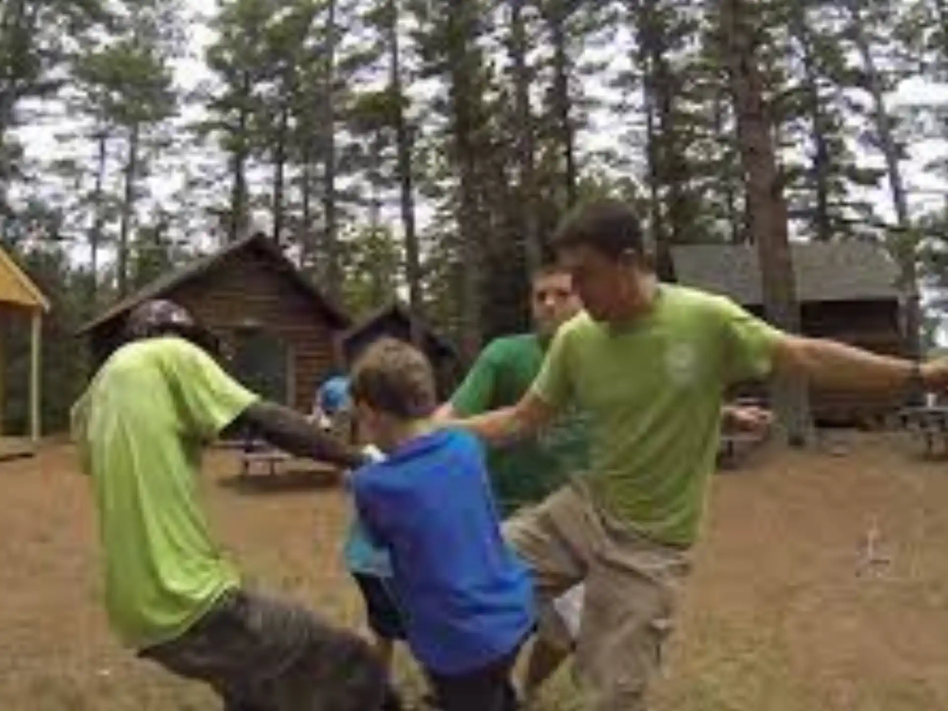 a group of people playing outside