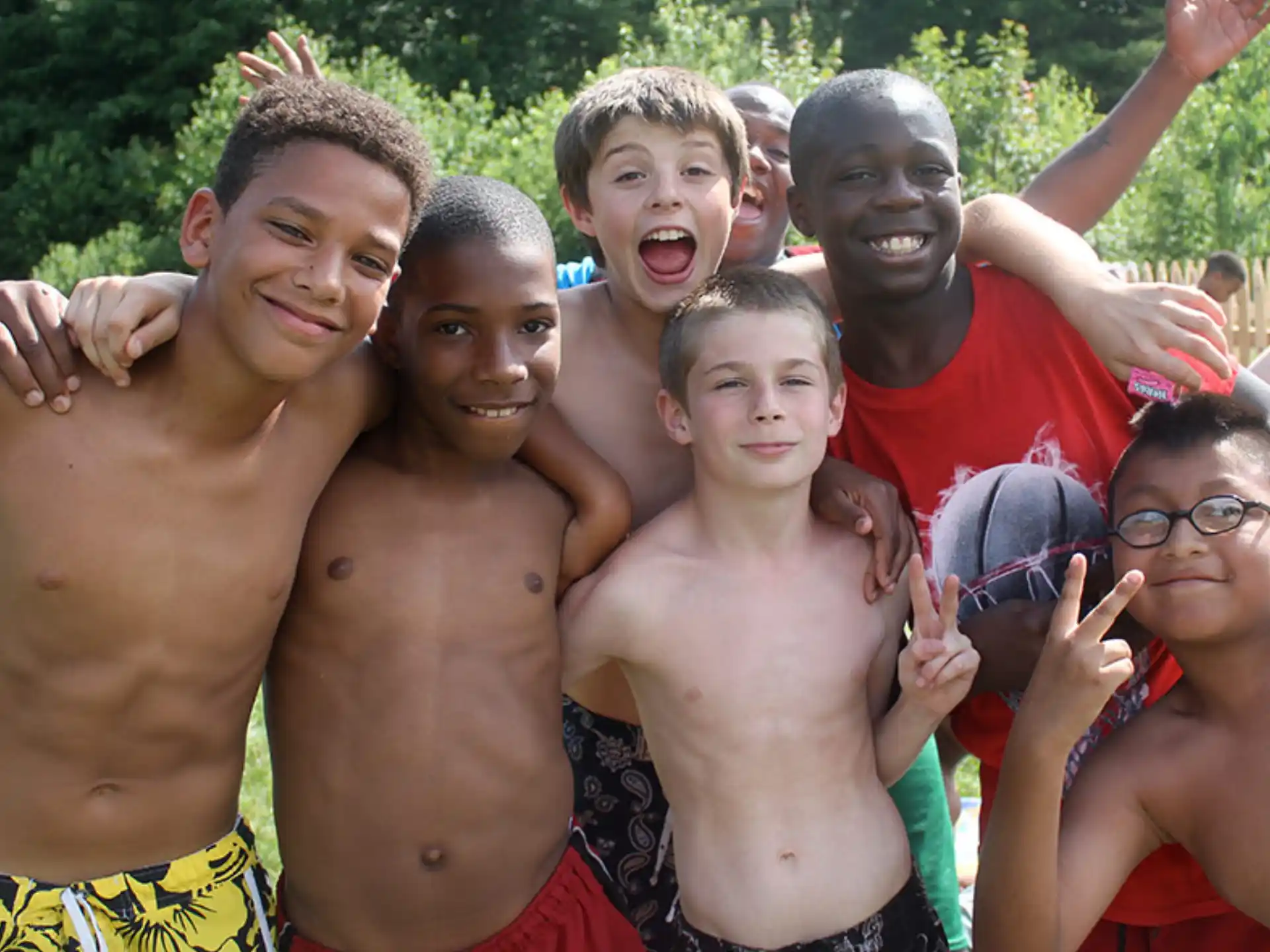 a group of people posing for the camera