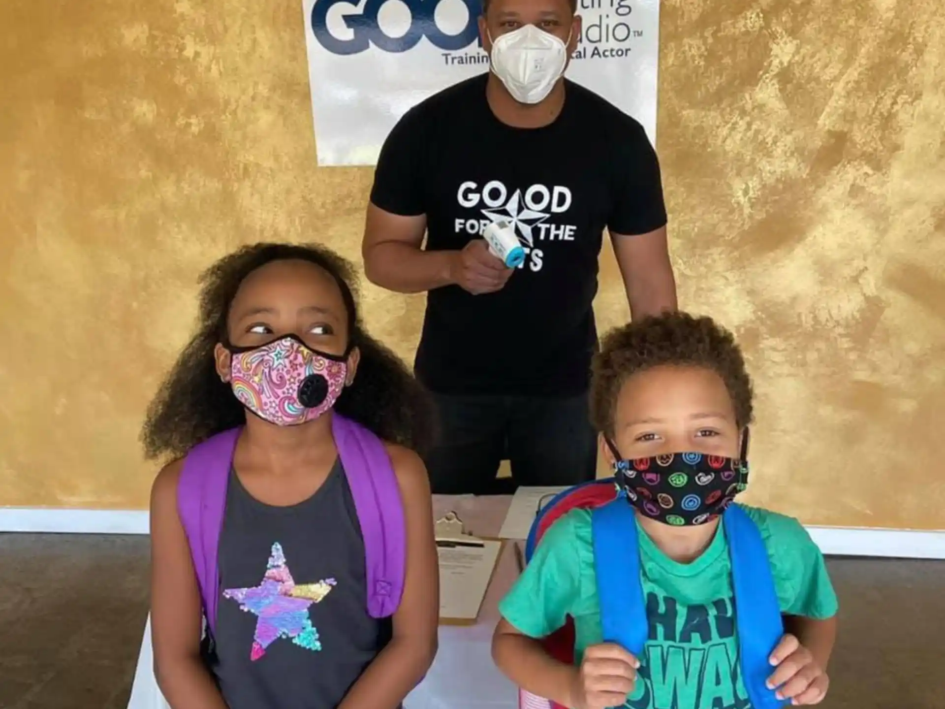 a group of children wearing face masks