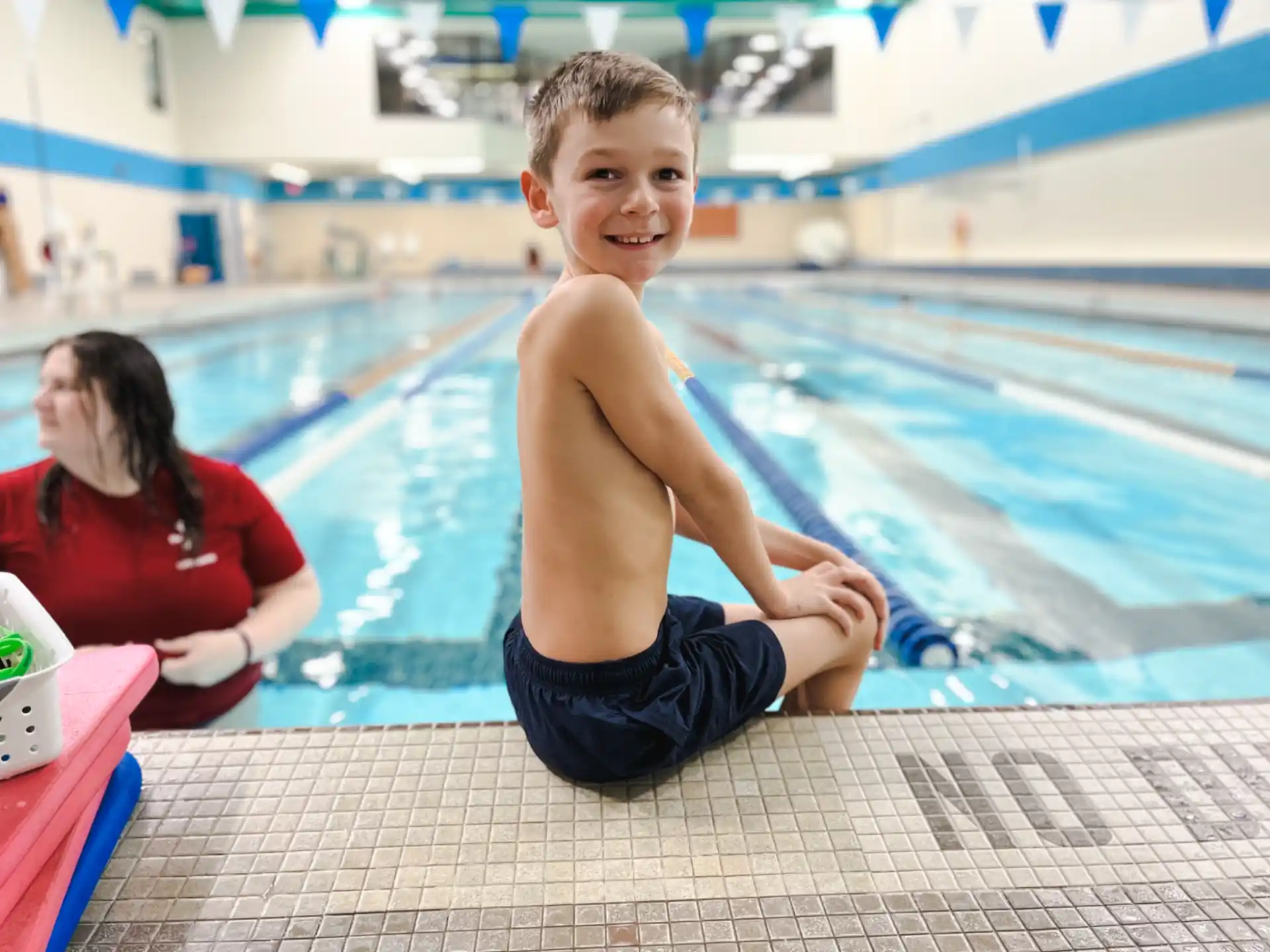 a boy in a pool