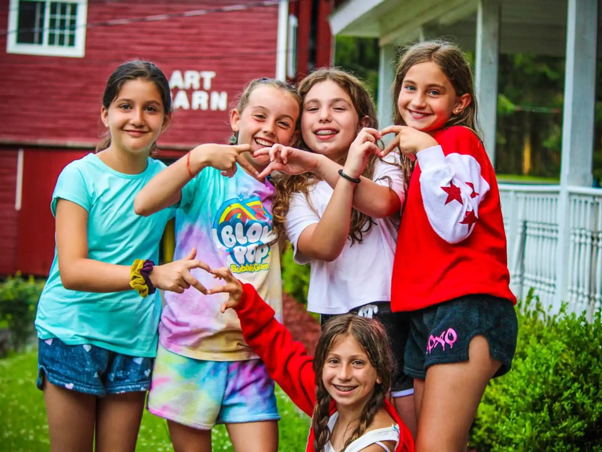 a group of girls posing for a picture