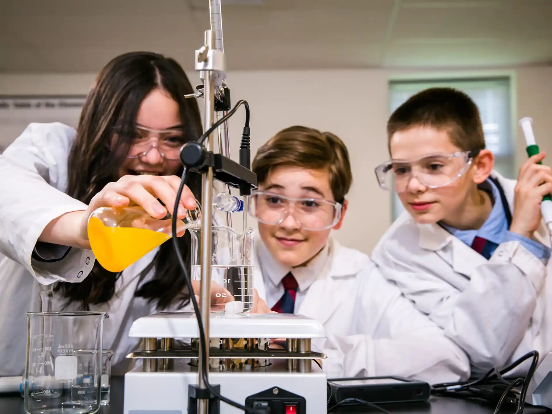 a group of people in lab coats