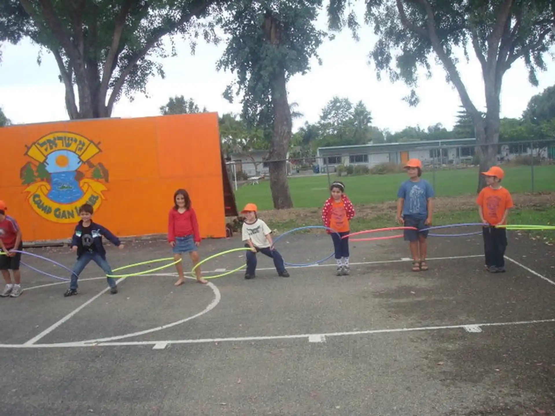 a group of kids playing in a playground