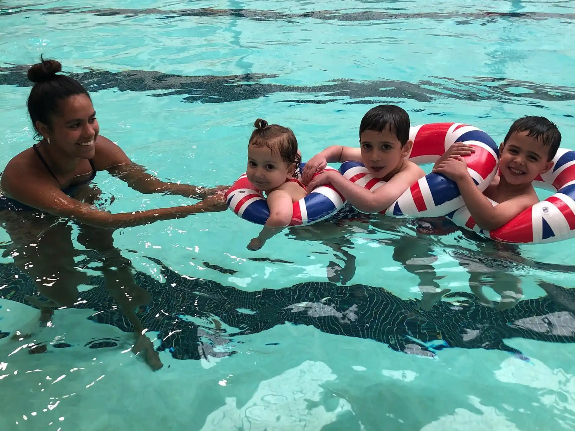 a group of people in a pool