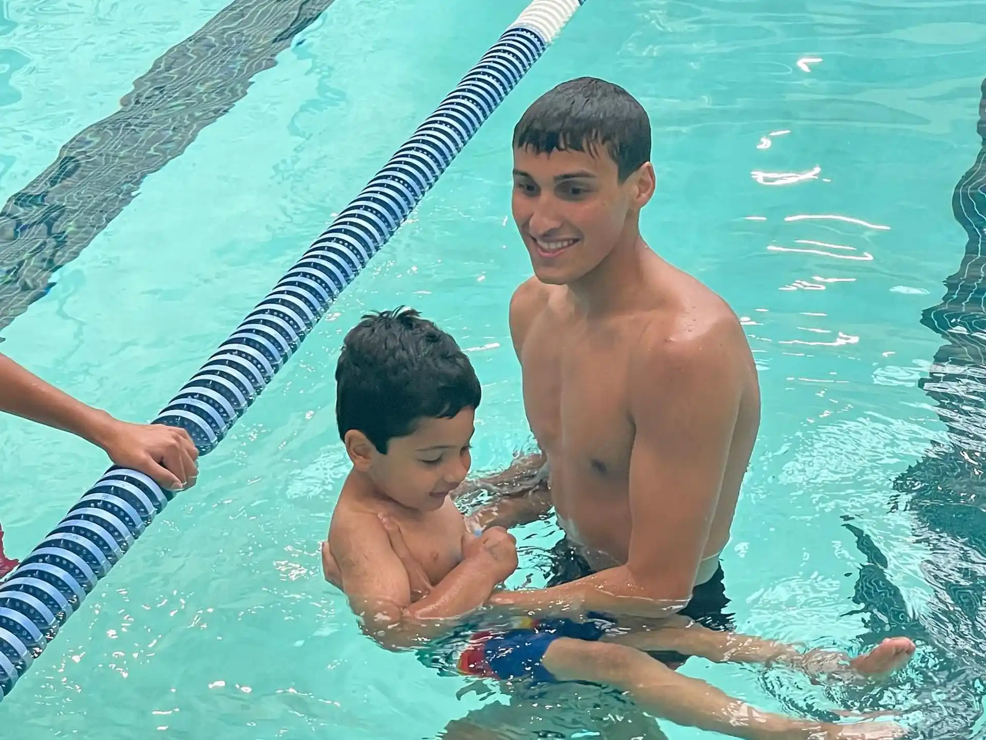 two boys in a pool