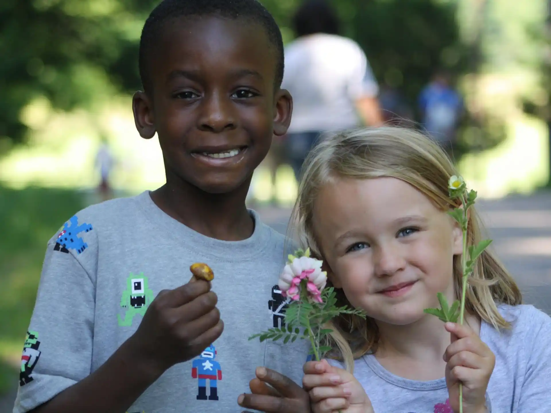 a boy and girl posing for a picture
