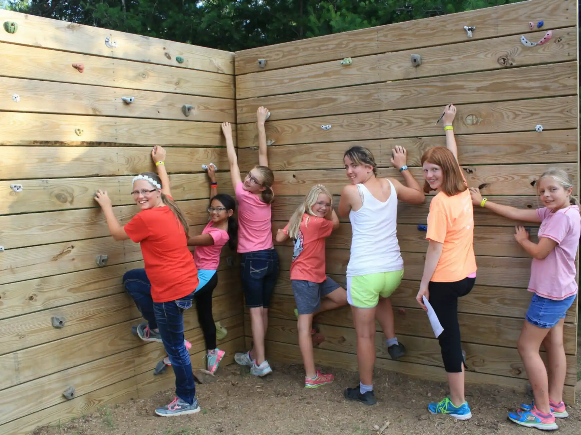 a group of girls posing for a photo