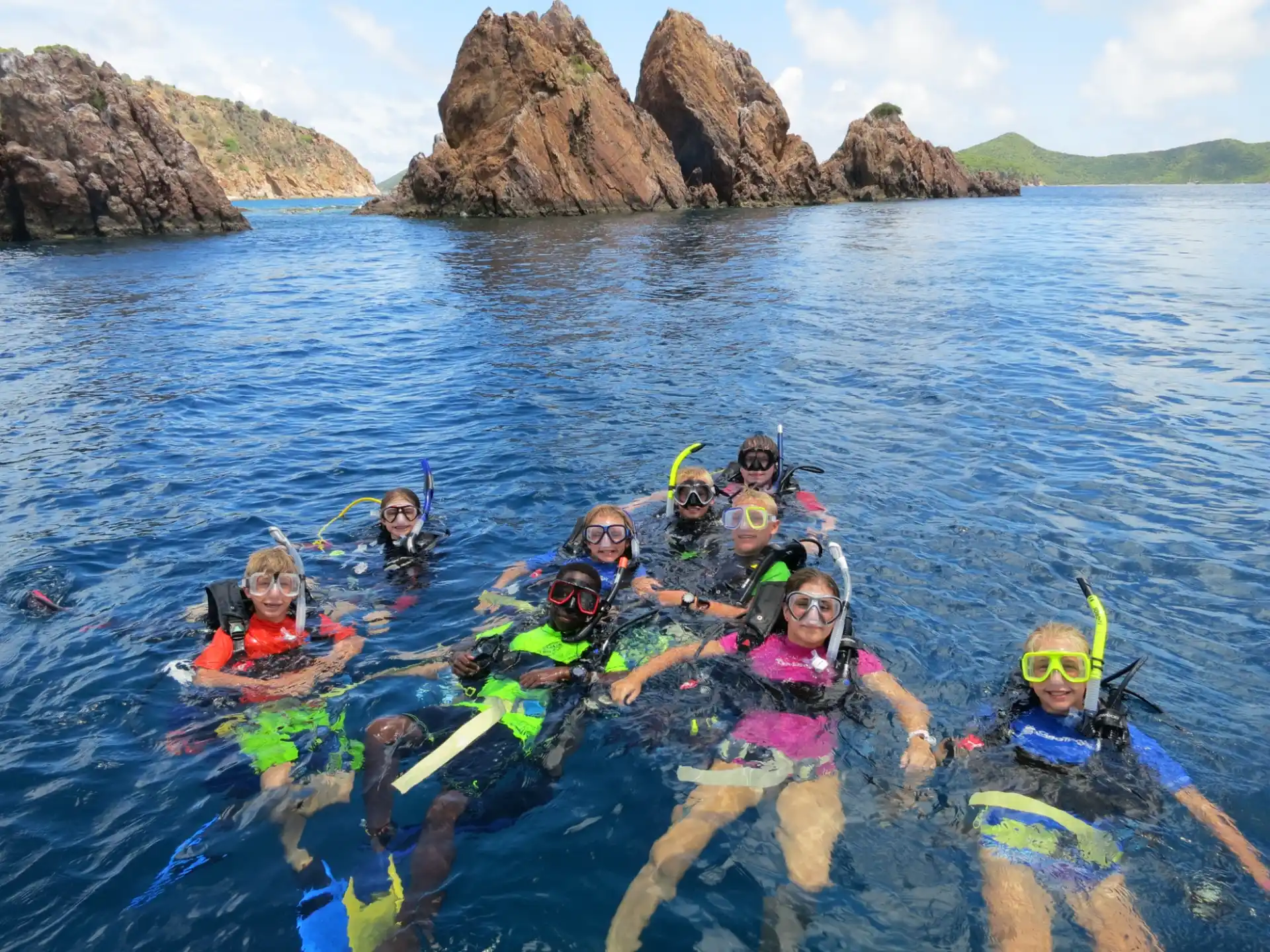 a group of people in the water