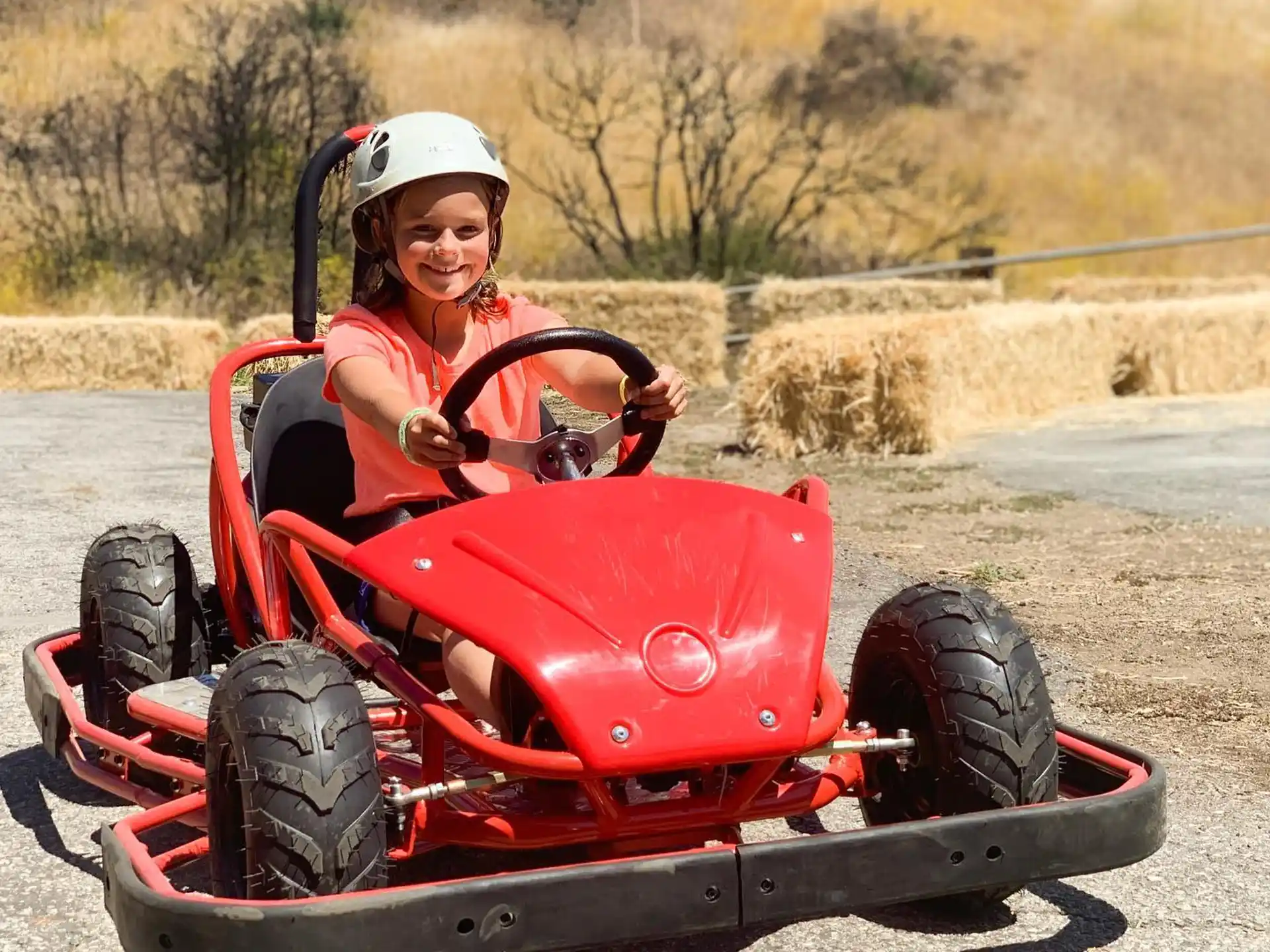 a man driving a go kart