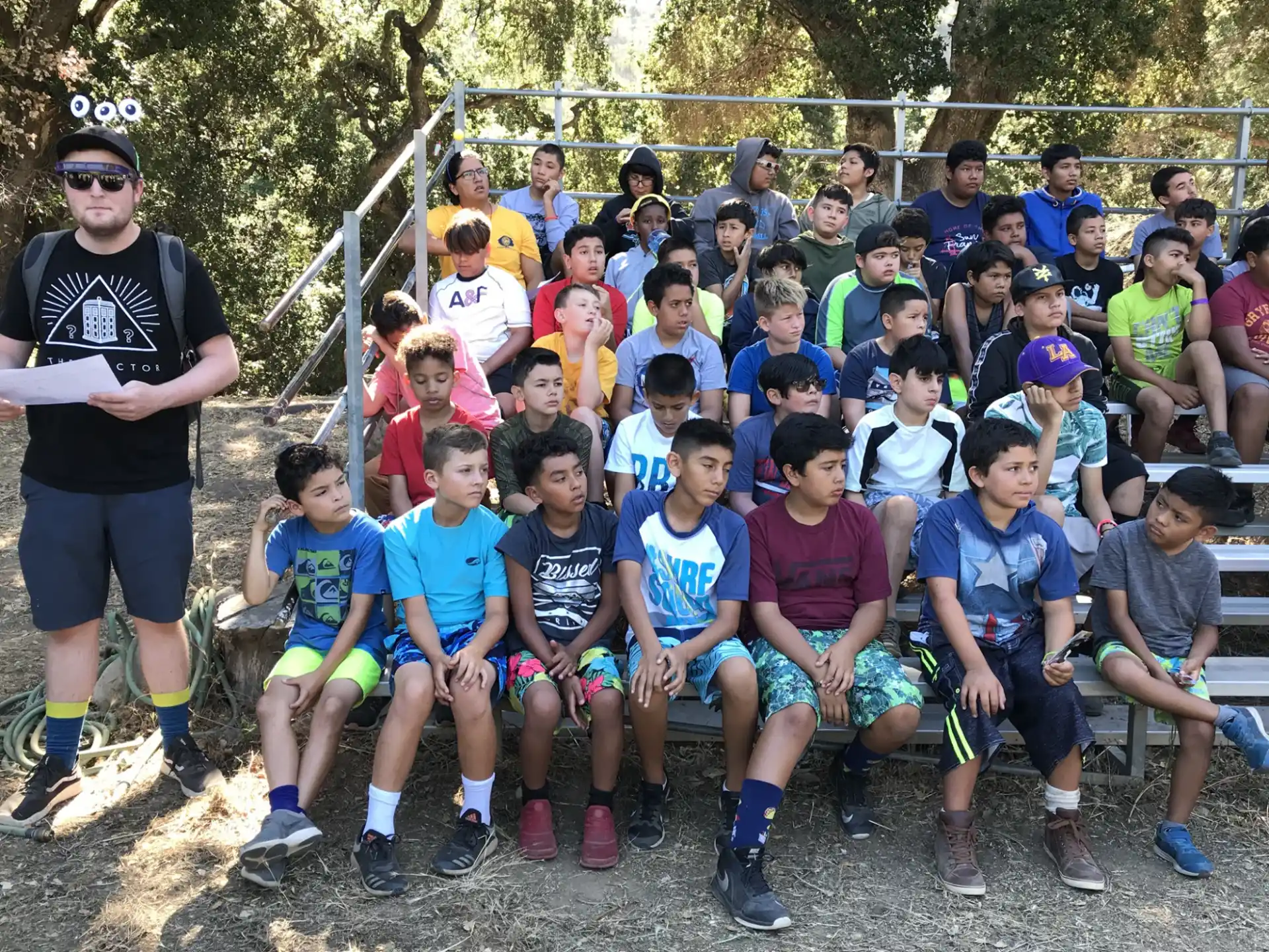 a group of kids posing for a photo