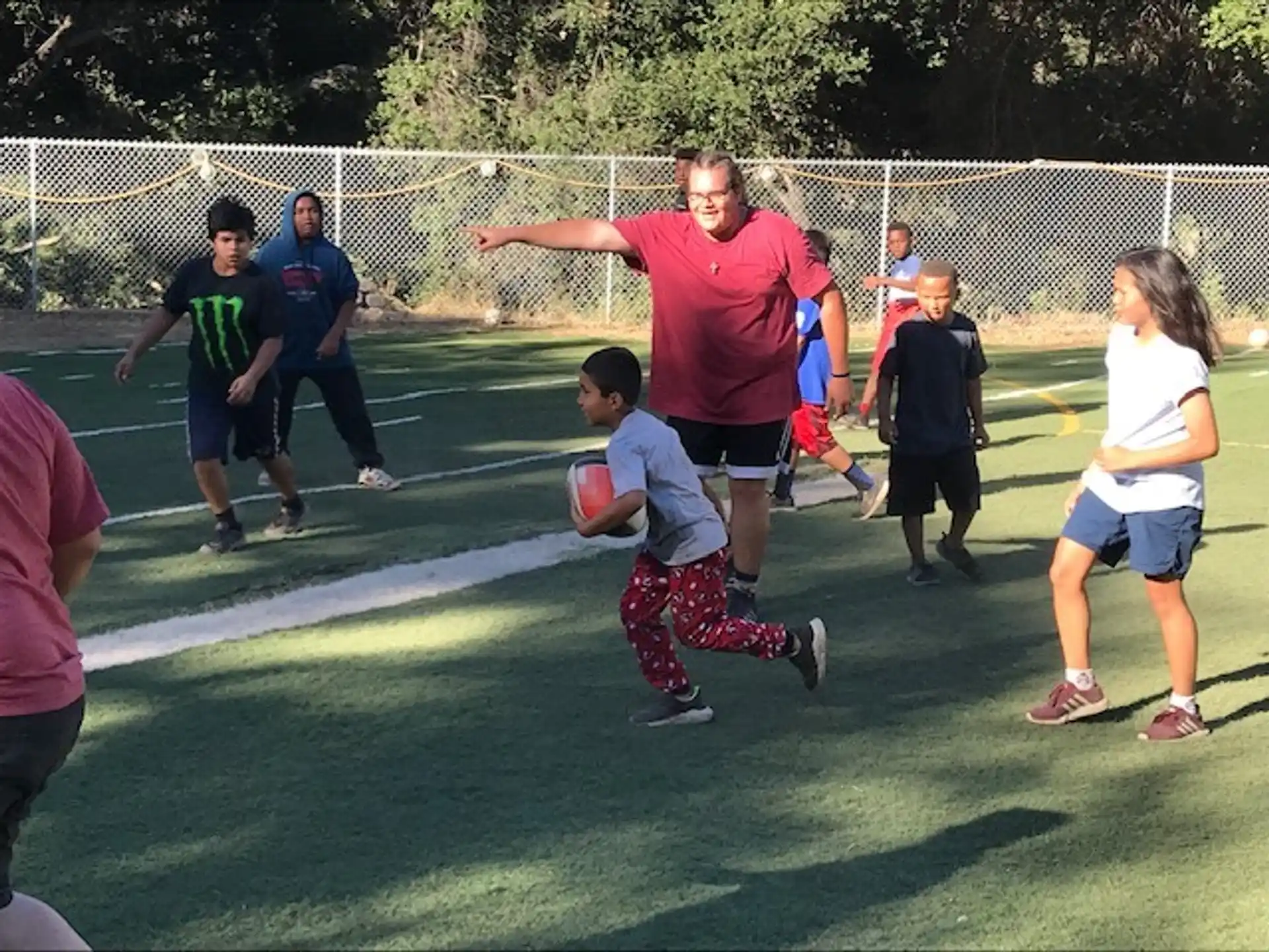 a person running with a ball