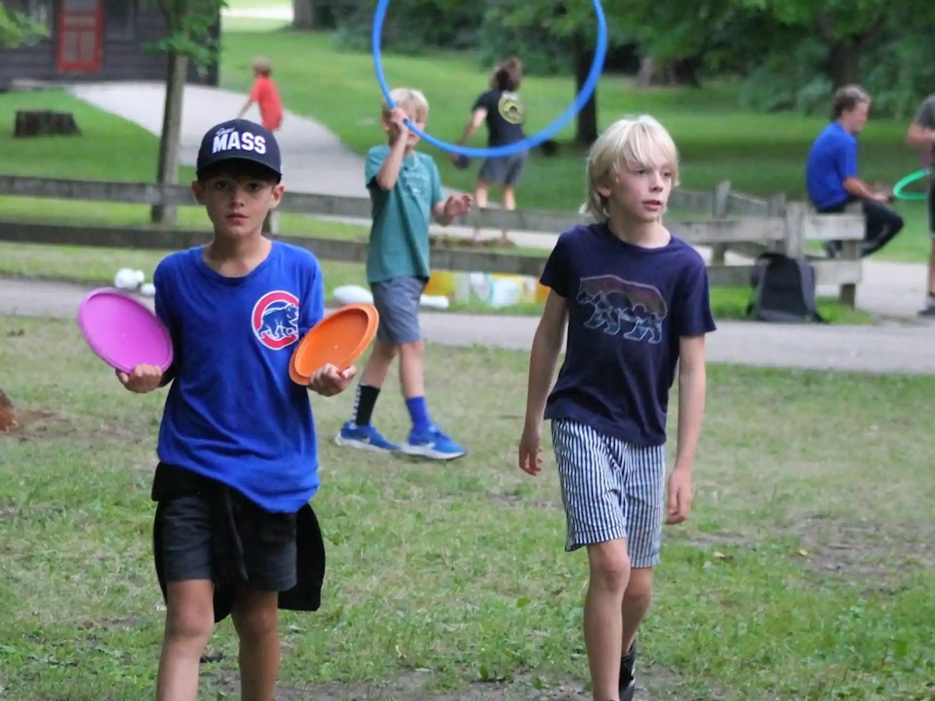 kids playing with frisbees