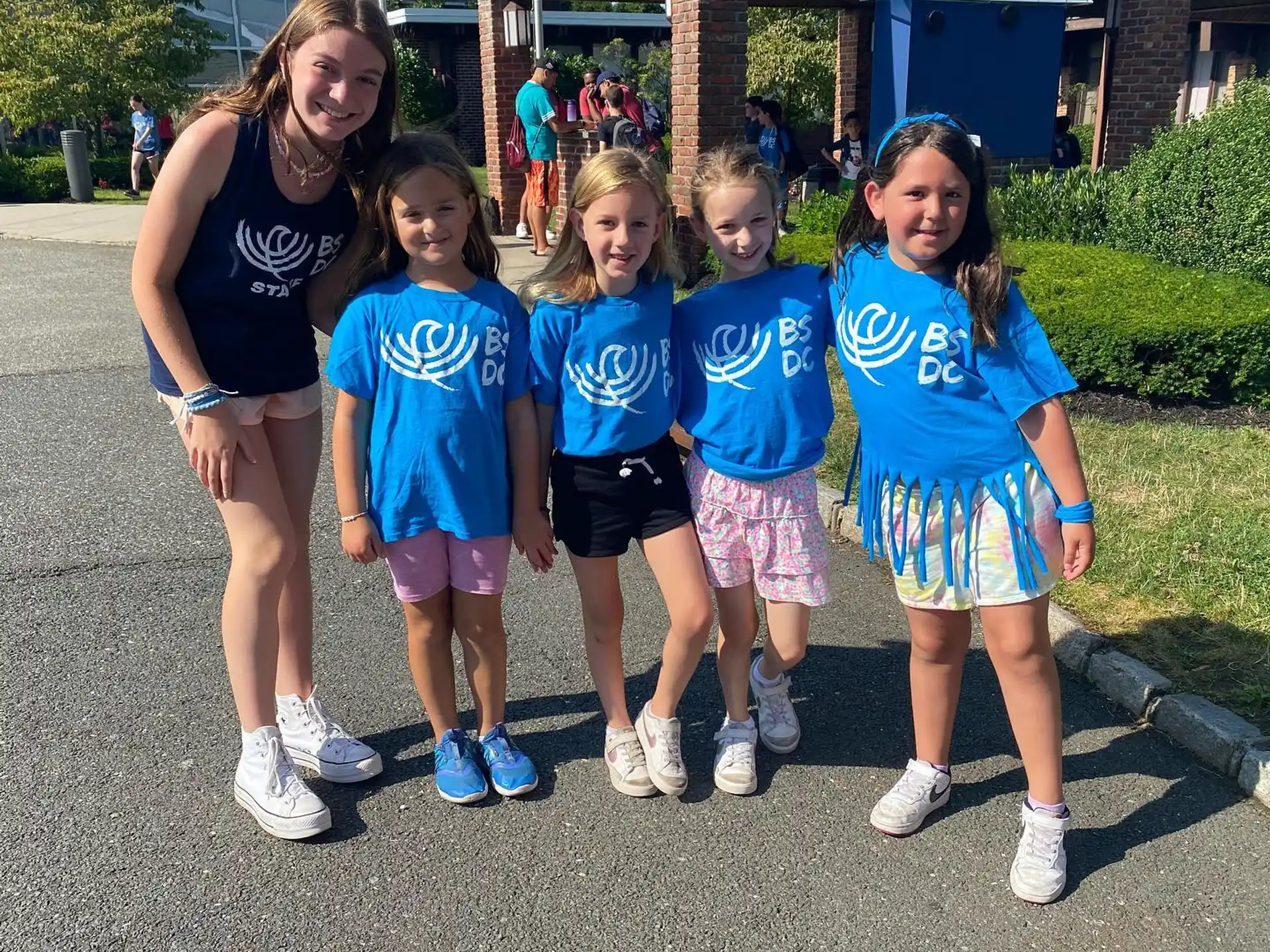 a group of girls posing for a photo