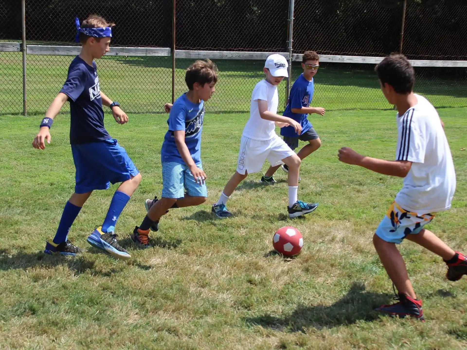 kids playing football on a field