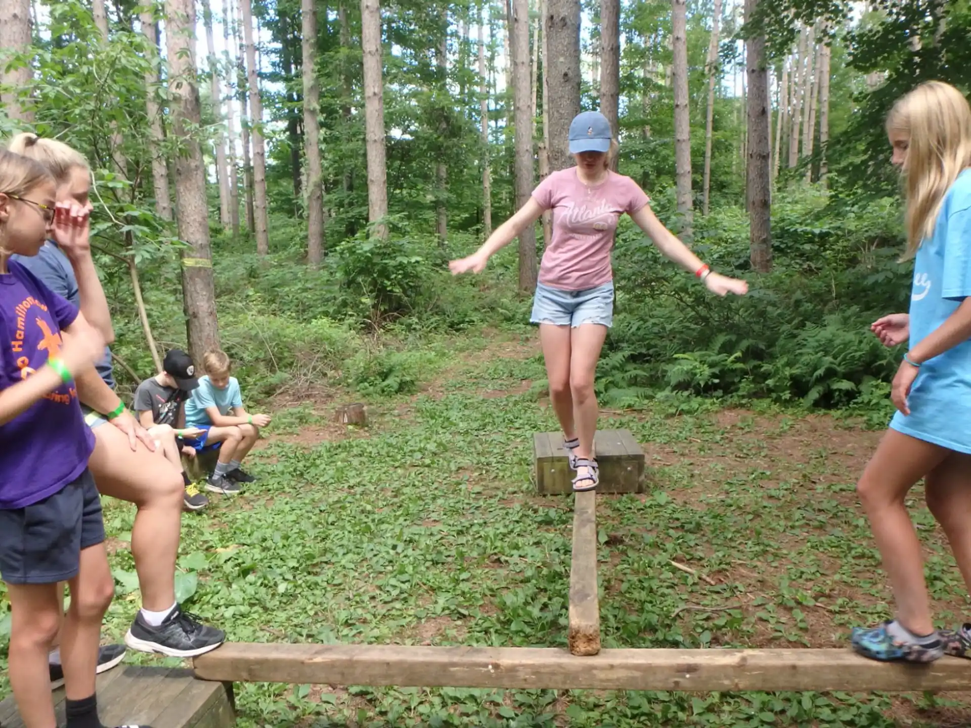 a group of people in a forest