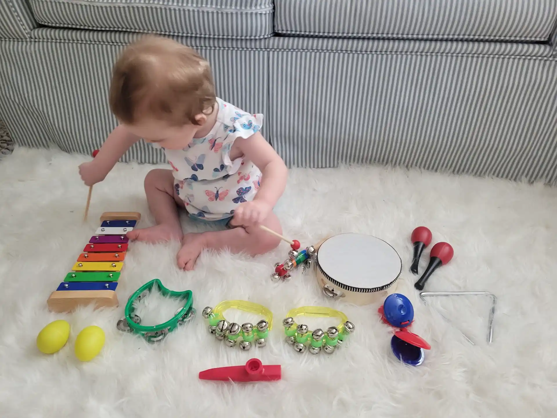 a baby playing with toys