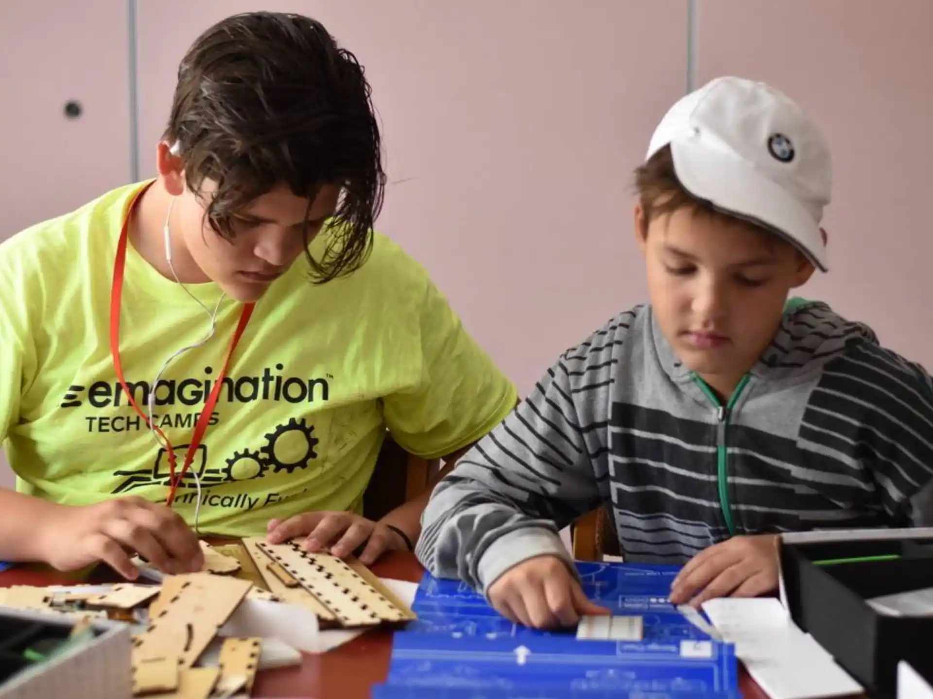 a few young people working on a project