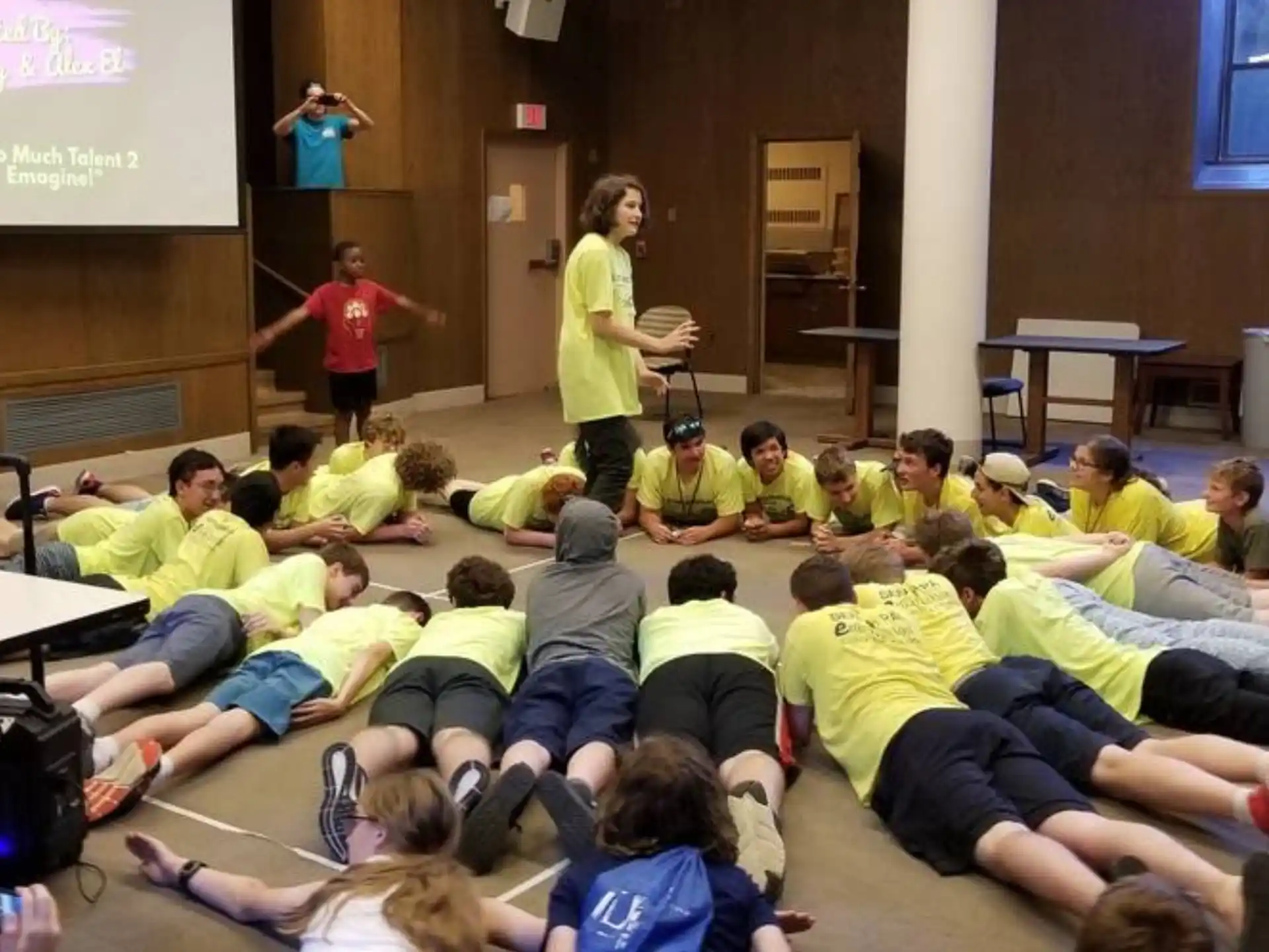 a group of people sitting in a room