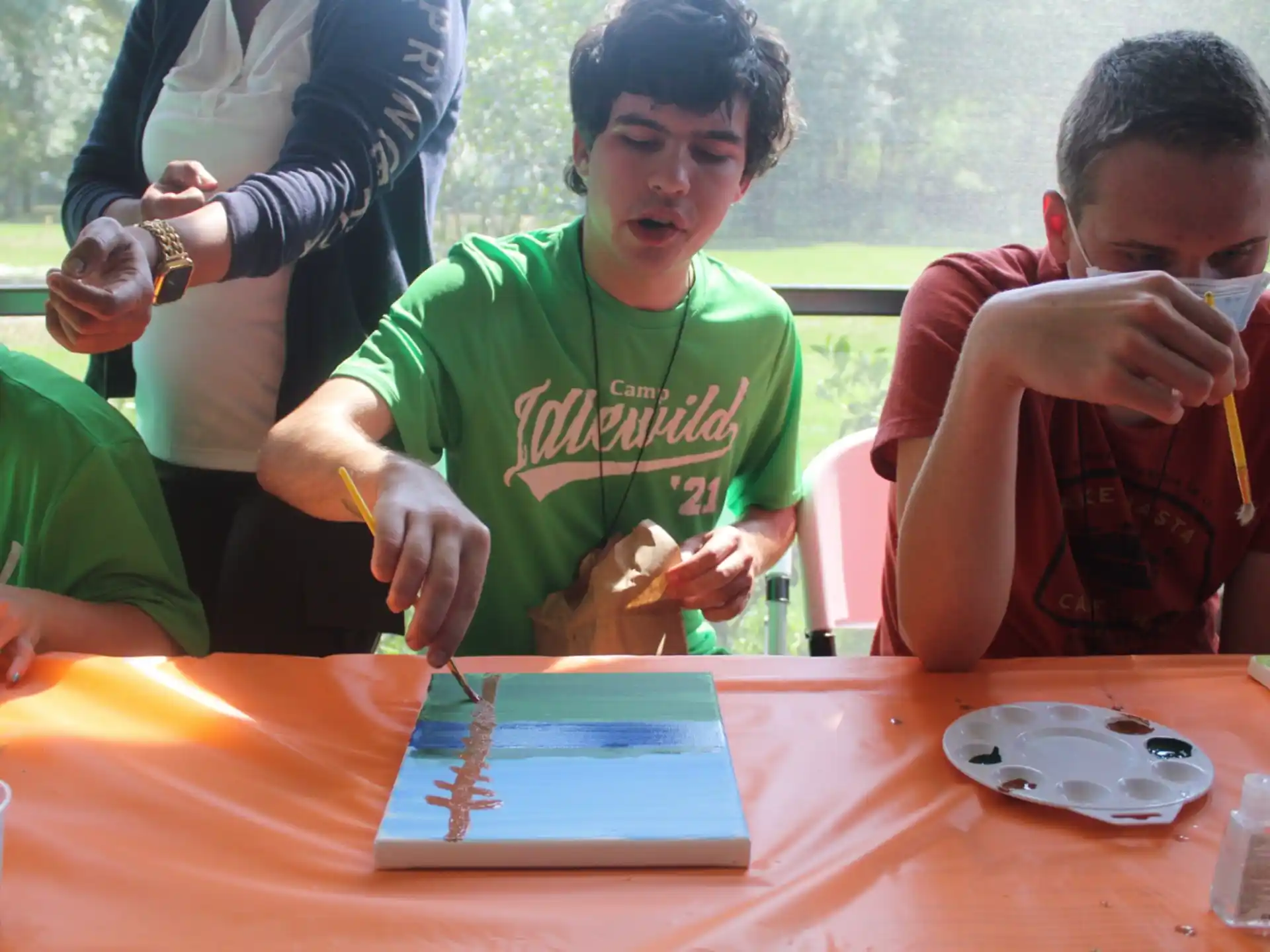 a group of people sitting at a table