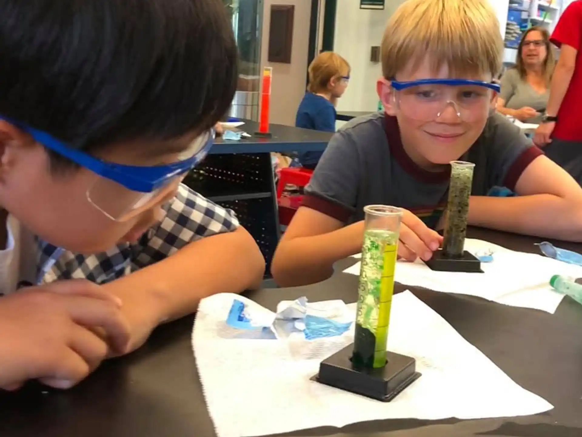 a couple of boys wearing glasses