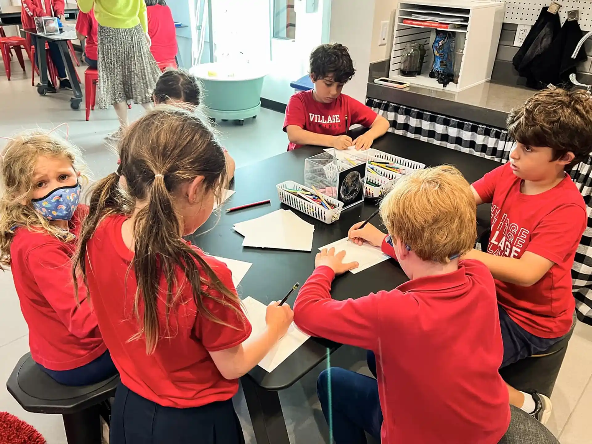 a group of children in a classroom