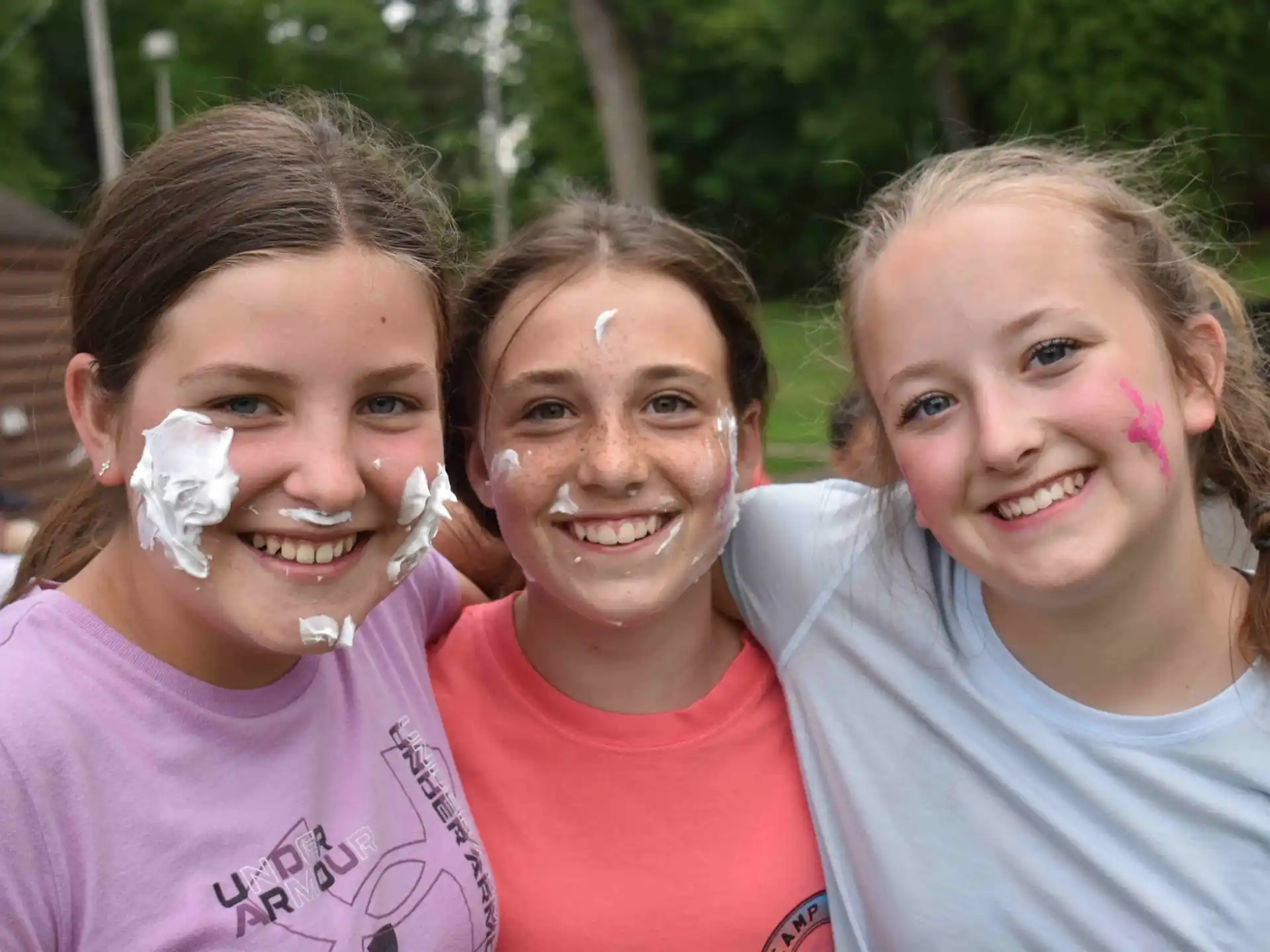 a group of girls smiling
