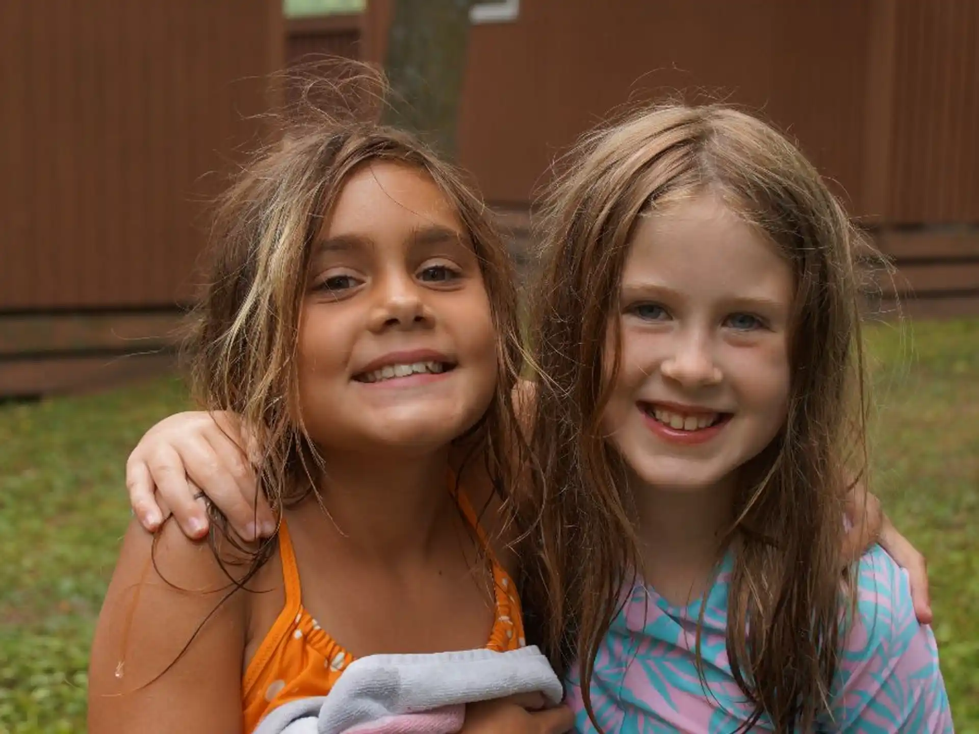 two girls smiling for a picture
