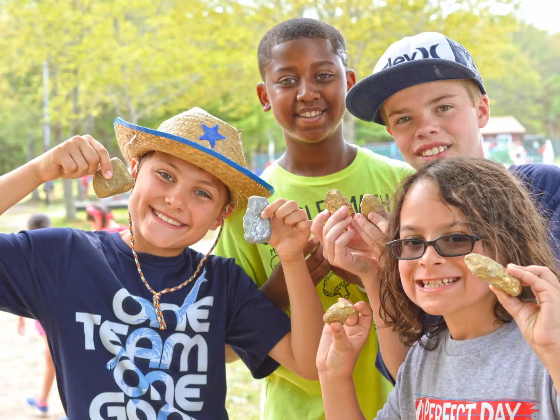 a group of people holding up their fingers