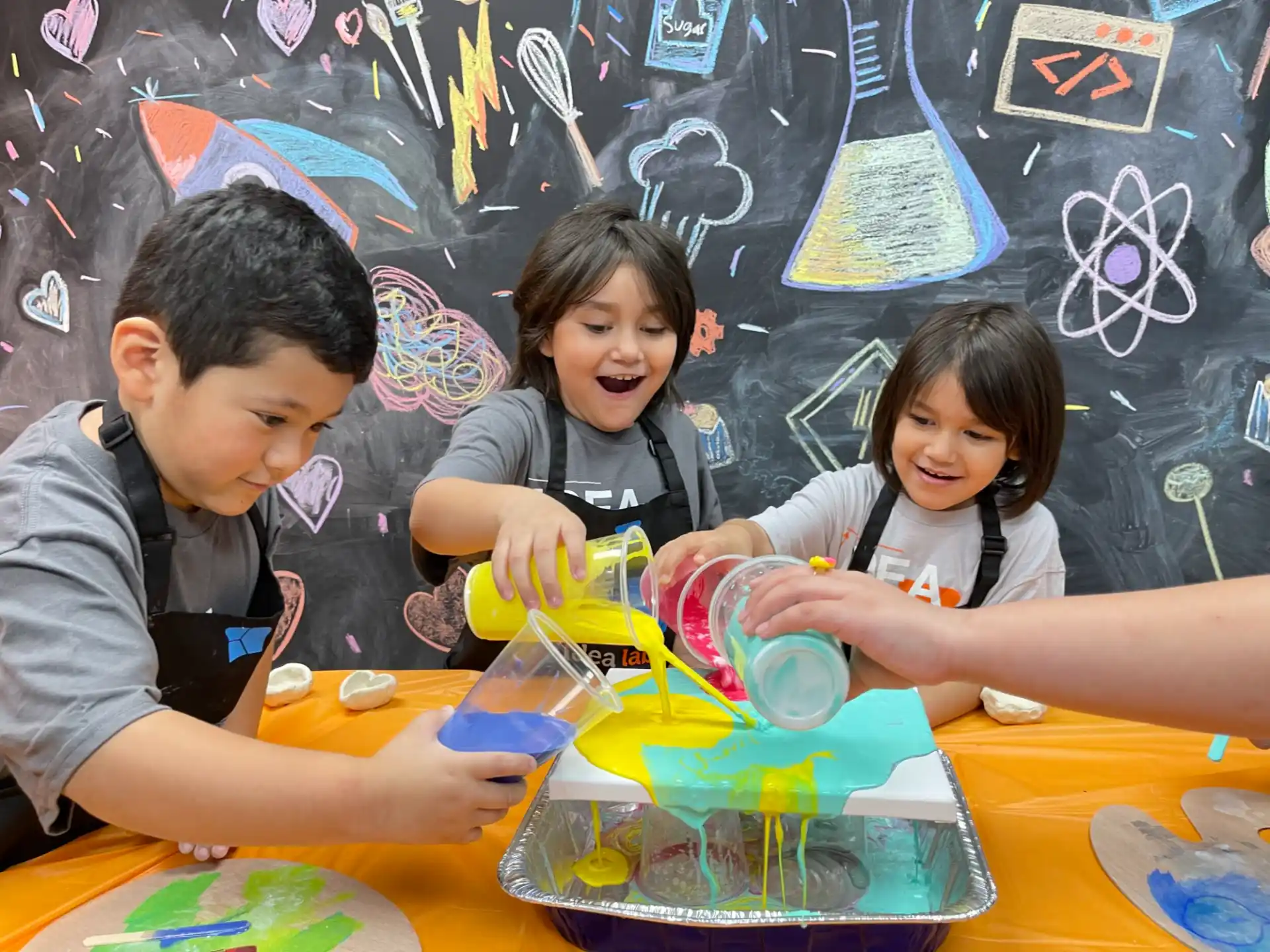 a group of children playing with toys