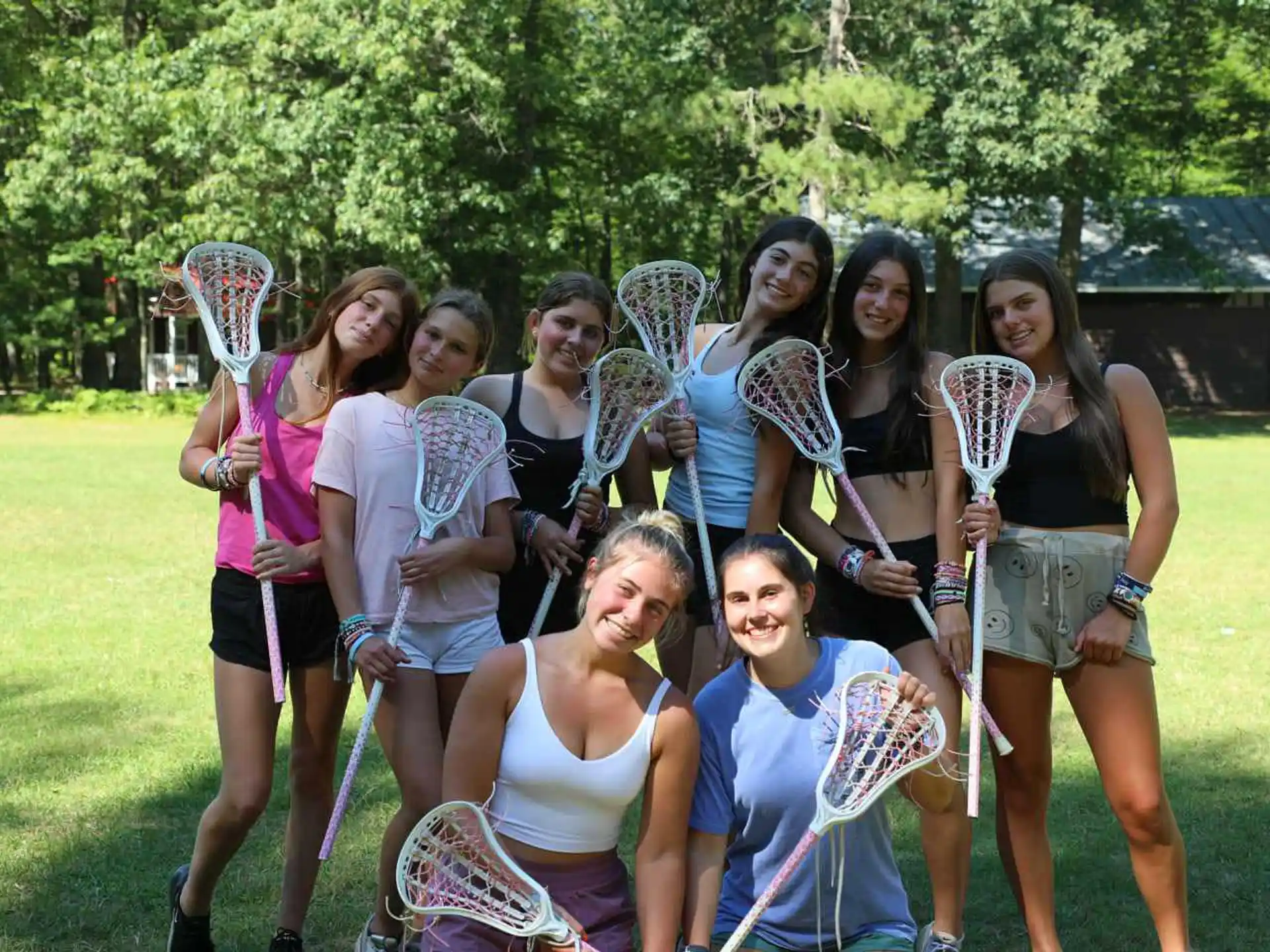 a group of people holding bows and arrows
