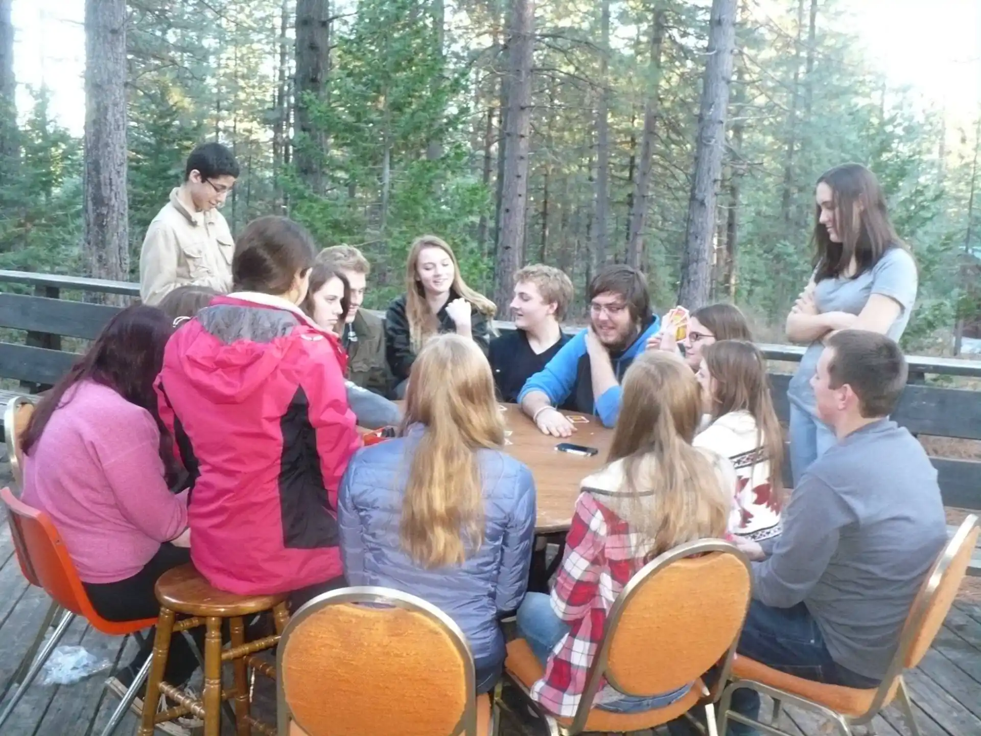 a group of people sitting at a table