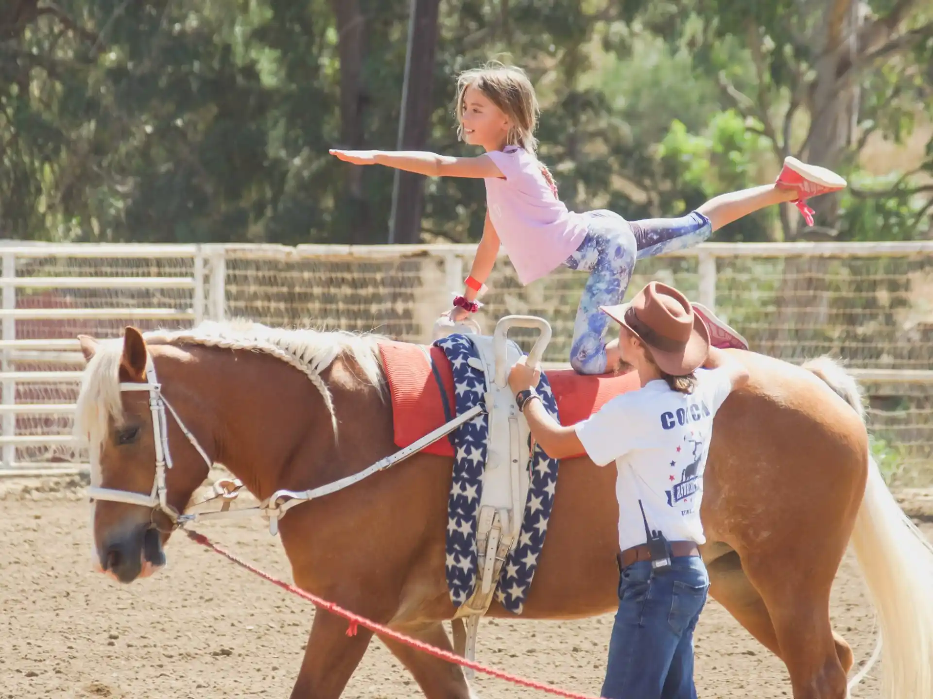 a girl riding a horse