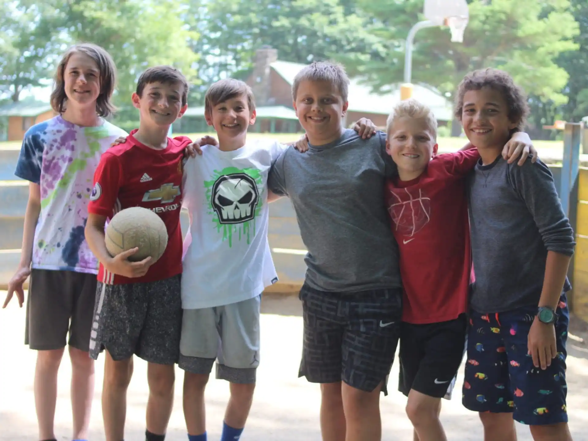 a group of kids posing for a picture